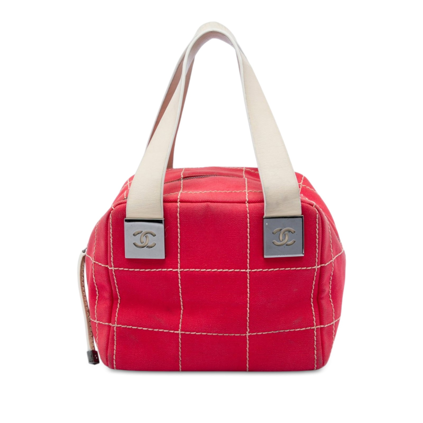 Chanel CC Chocolate Bar Wild Stitch Red Canvas Handbag: Chanel CC Chocolate Bar Wild Stitch Red Canvas Handbag A Chanel CC Chocolate Bar Canvas Wild Stitch handbag crafted with a canvas body and flat leather handles. The bag features a top zip closure and 