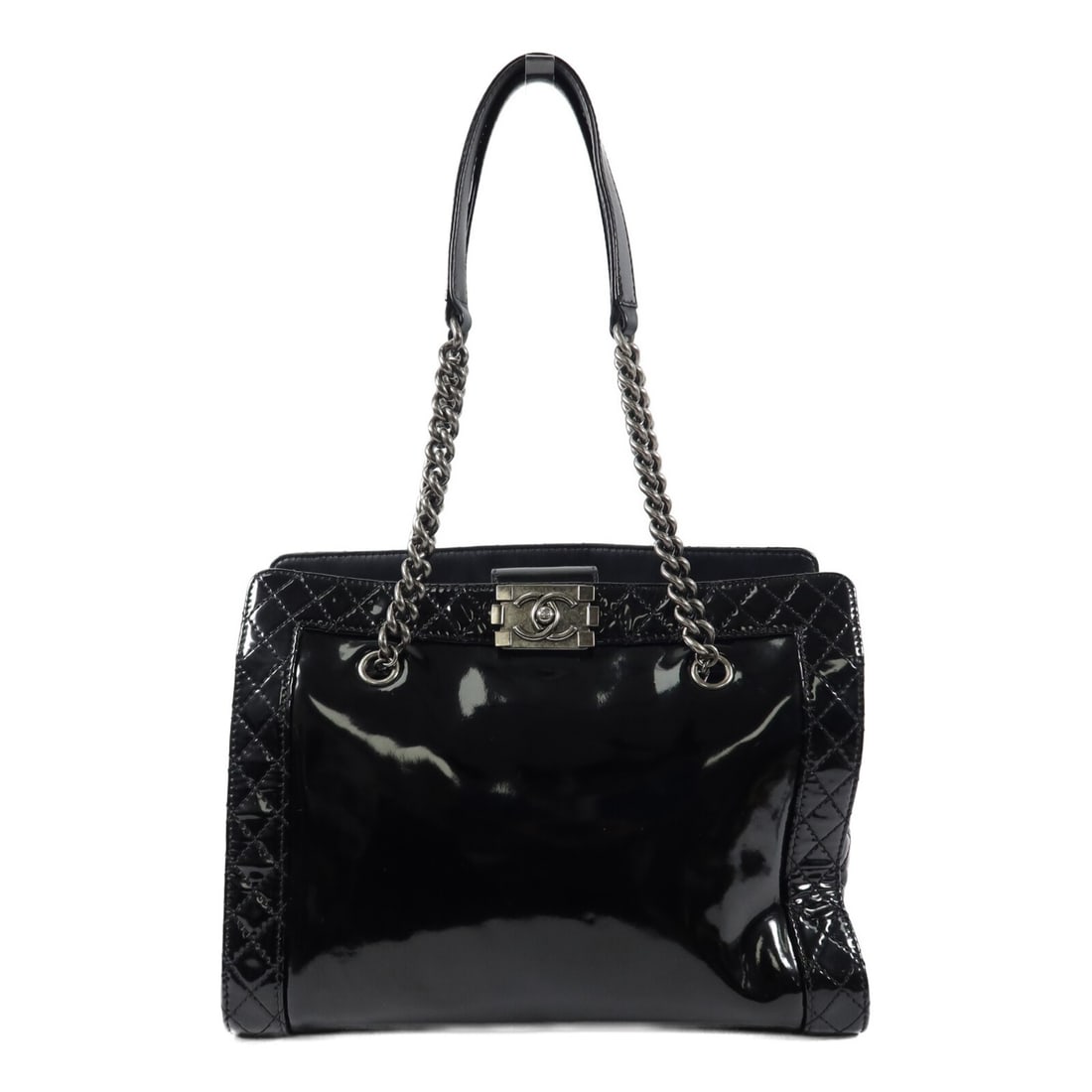 CHANEL Boy CC Tote Bag in Black Patent Leather: CHANEL Boy CC Tote Bag in Black Patent Leather Chanel Boy tote bag in black patent leather with CC detailing and silver-tone hardware. This women's tote is made in Italy and features an organized inte