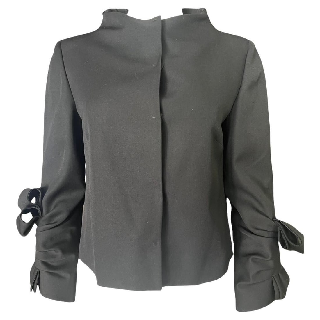 Valentino Cropped Wool Jacket Black Size 10 with Bow Sleeves: Valentino Cropped Wool Jacket Black Size 10 with Bow Sleeves A Valentino black wool blazer jacket in a cropped style, featuring a collar, 3/4 sleeves with bow detail, and a front button closure. Condi