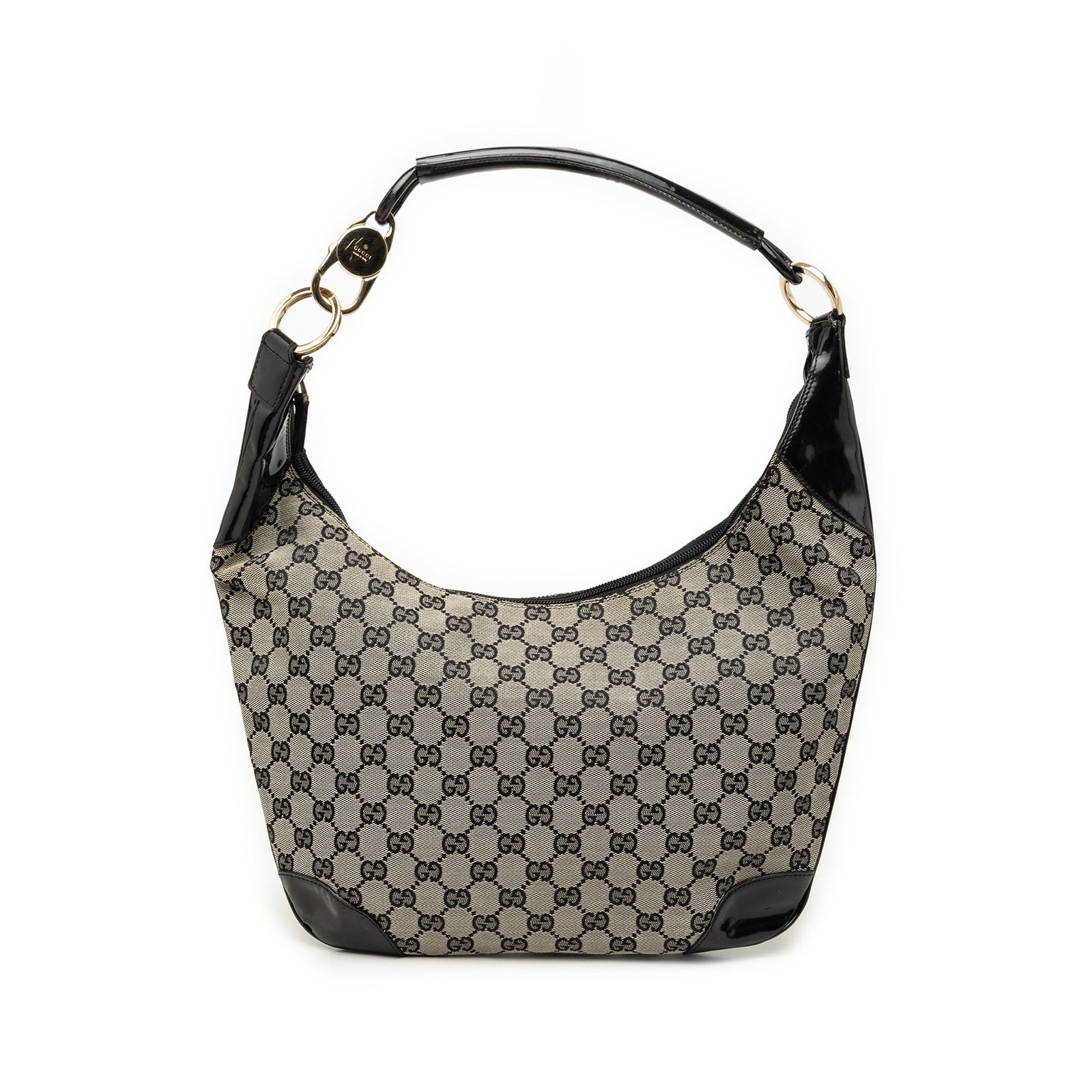 Gucci GG Canvas Patent Leather Trim Shoulder Bag Beige: Gucci GG Canvas Patent Leather Trim Shoulder Bag Beige Gucci GG Canvas Shoulder Bag in beige with a canvas body, patent leather trim, a rolled leather handle, top zip closure, and an interior zip pock