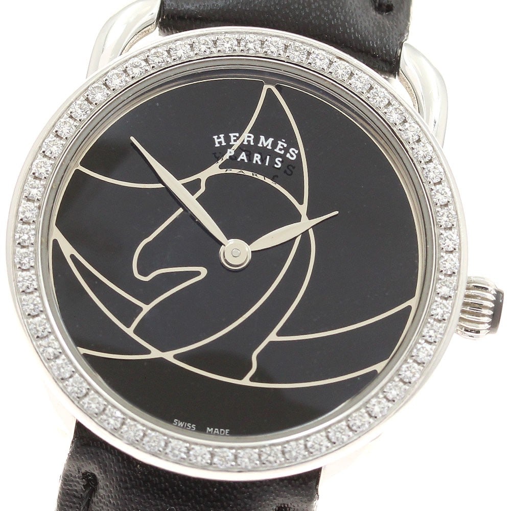 Hermes Arceau Casaque womens quartz watch AR5.232 diamond bezel: Hermes Arceau Casaque womens quartz watch AR5.232 diamond bezel Hermes Arceau Casaque women's wristwatch with a diamond bezel and quartz movement. This Swiss-made watch features a black dial, stainles