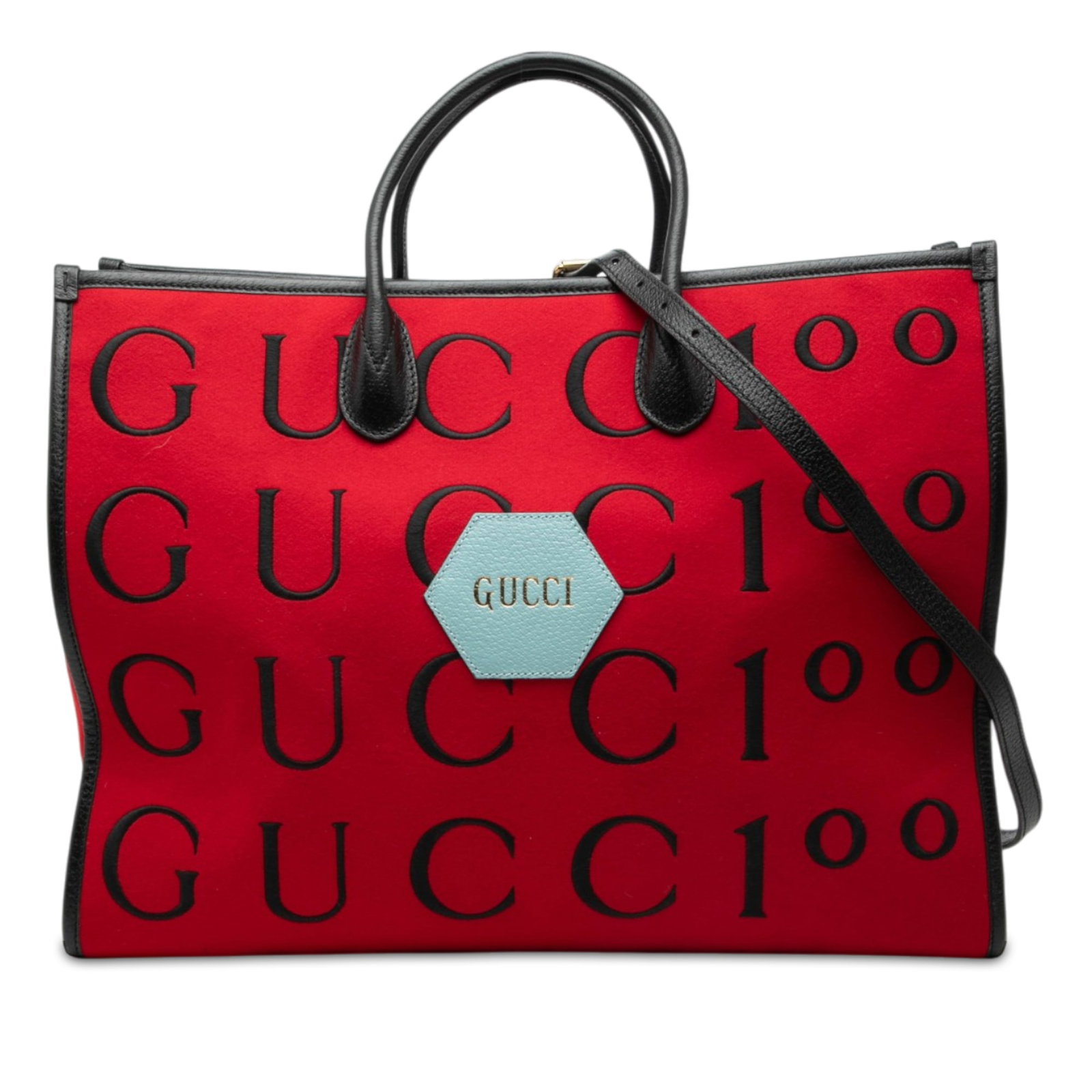 Gucci 100th Anniversary Felt Shopping Tote with Calfskin Trim: Gucci 100th Anniversary Felt Shopping Tote with Calfskin Trim Gucci 100th Anniversary shopping tote crafted with a felt body and calfskin leather trim. It features rolled leather handles, a detachable