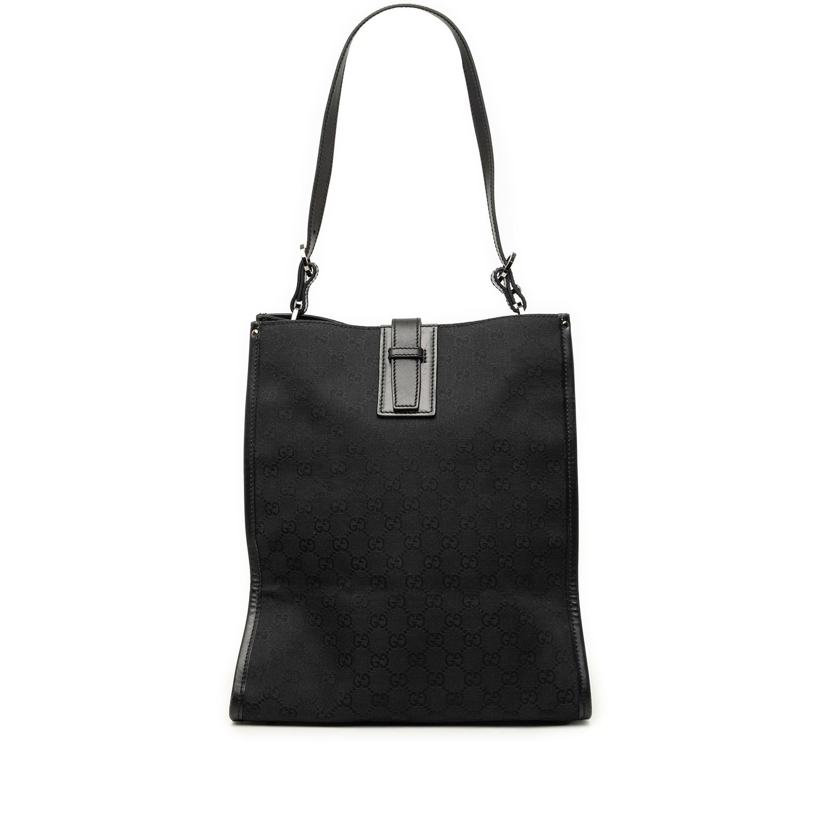 Gucci GG Canvas Tote Bag Black Leather Trim: Gucci GG Canvas Tote Bag Black Leather Trim Gucci GG Canvas Tote in black canvas with leather trim. This tote features flat leather straps, a top strap with tuck closure, and an interior zip pocket. M