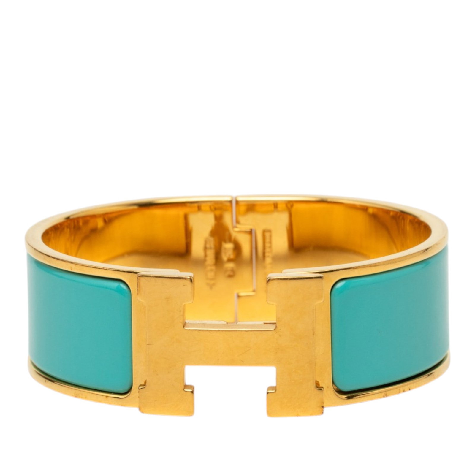 Hermes Clic H PM Wide Enamel Bracelet Blue: Hermes Clic H PM Wide Enamel Bracelet Blue Hermes Wide Enamel Clic H Bracelet PM in blue enamel with gold-plated metal and a metal clasp closure. Made in France, this costume bracelet shows signs of w