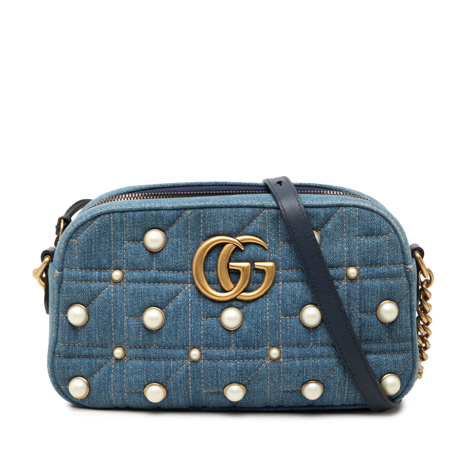 Gucci GG Marmont small denim crossbody with faux pearl studs: Gucci GG Marmont small denim crossbody with faux pearl studs Gucci Small GG Marmont crossbody bag in blue denim with faux pearl stud detailing. The bag features a chain link strap with a leather guard
