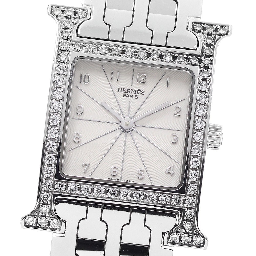 Hermes H-Watch HH1.230 Ladies Quartz Wristwatch Diamond Bezel: Hermes H-Watch HH1.230 Ladies Quartz Wristwatch Diamond Bezel Hermes H-Watch women's wristwatch with a diamond bezel and quartz movement. This Swiss-made watch features a silver dial with a stainless 