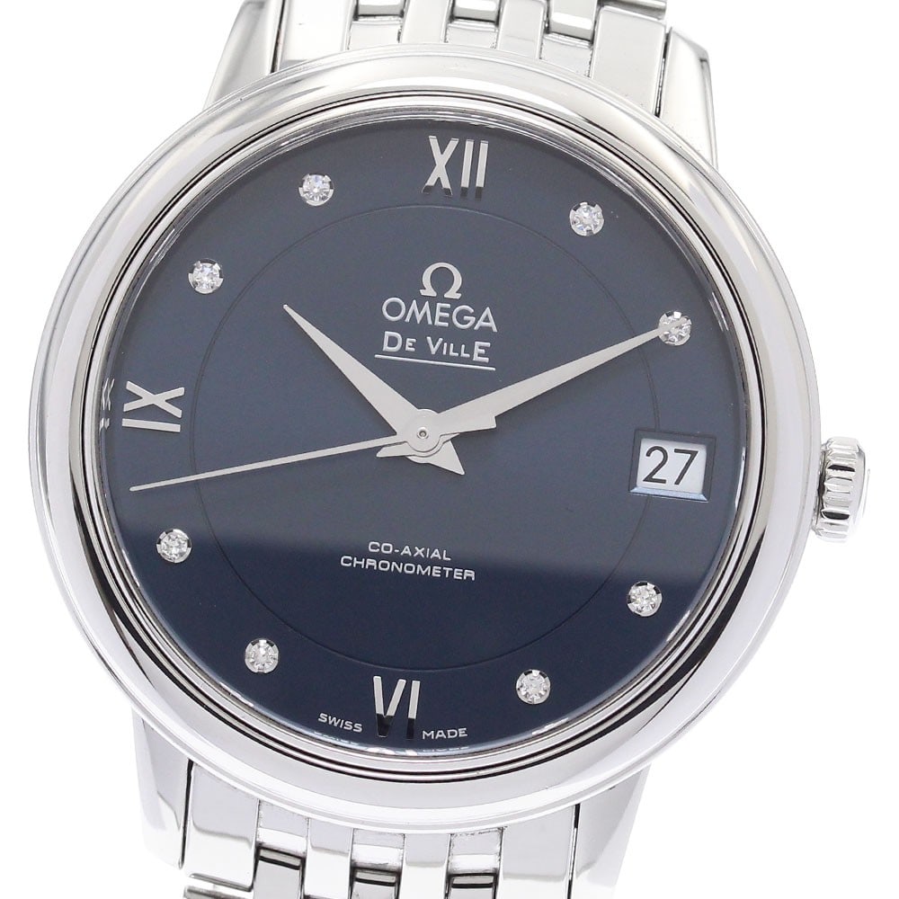 OMEGA De Ville Prestige 424.10.33.20.53.001 33mm Diamond Date Watch: OMEGA De Ville Prestige 424.10.33.20.53.001 33mm Diamond Date Watch OMEGA De Ville Prestige wristwatch with a navy dial, automatic movement, and date display. This reference 424.10.33.20.53.001 featur