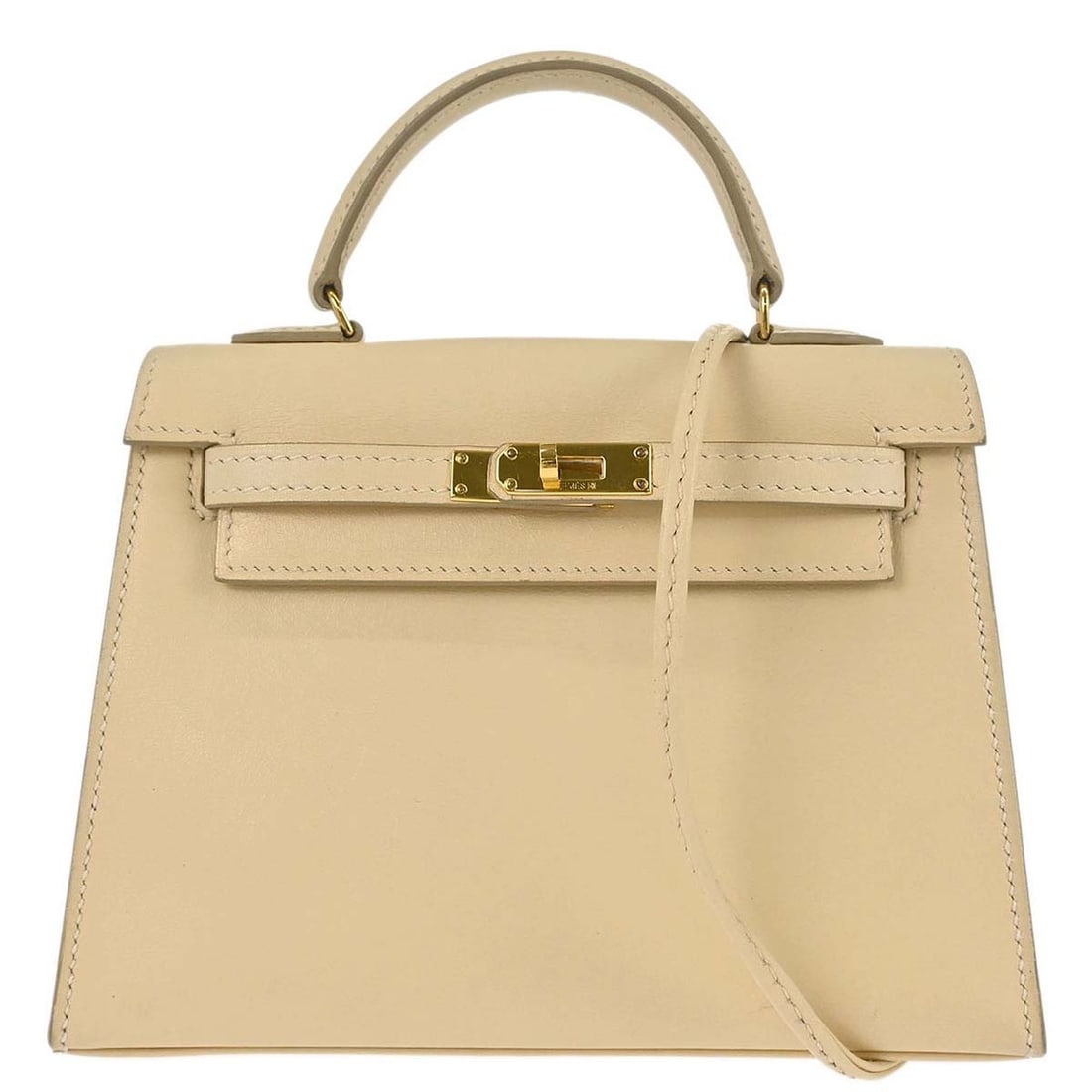 Hermes Mini Kelly 15 Swift Sellier 2way Top Handle Bag Parchemin: Hermes Mini Kelly 15 Swift Sellier 2way Top Handle Bag Parchemin This Hermes Mini Kelly 15 2way Sellier handbag is crafted in Swift leather with a coated finish and Parchemin exterior color. It featur