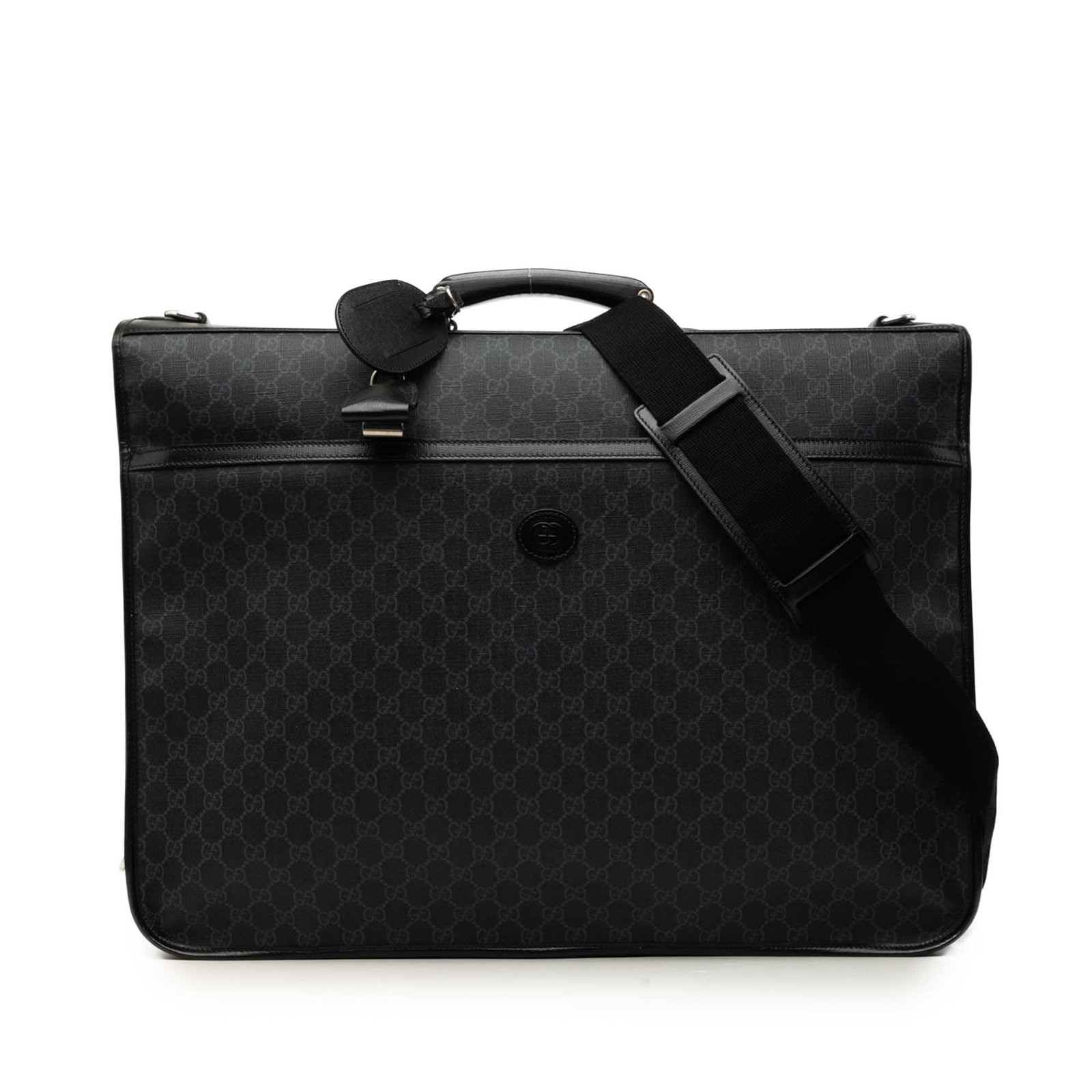 Gucci GG Supreme Retro Interlocking G Black Garment Bag: Gucci GG Supreme Retro Interlocking G Black Garment Bag Gucci GG Supreme Retro Interlocking G garment bag with a coated canvas body and leather trim. It features a rolled leather top handle, a detacha