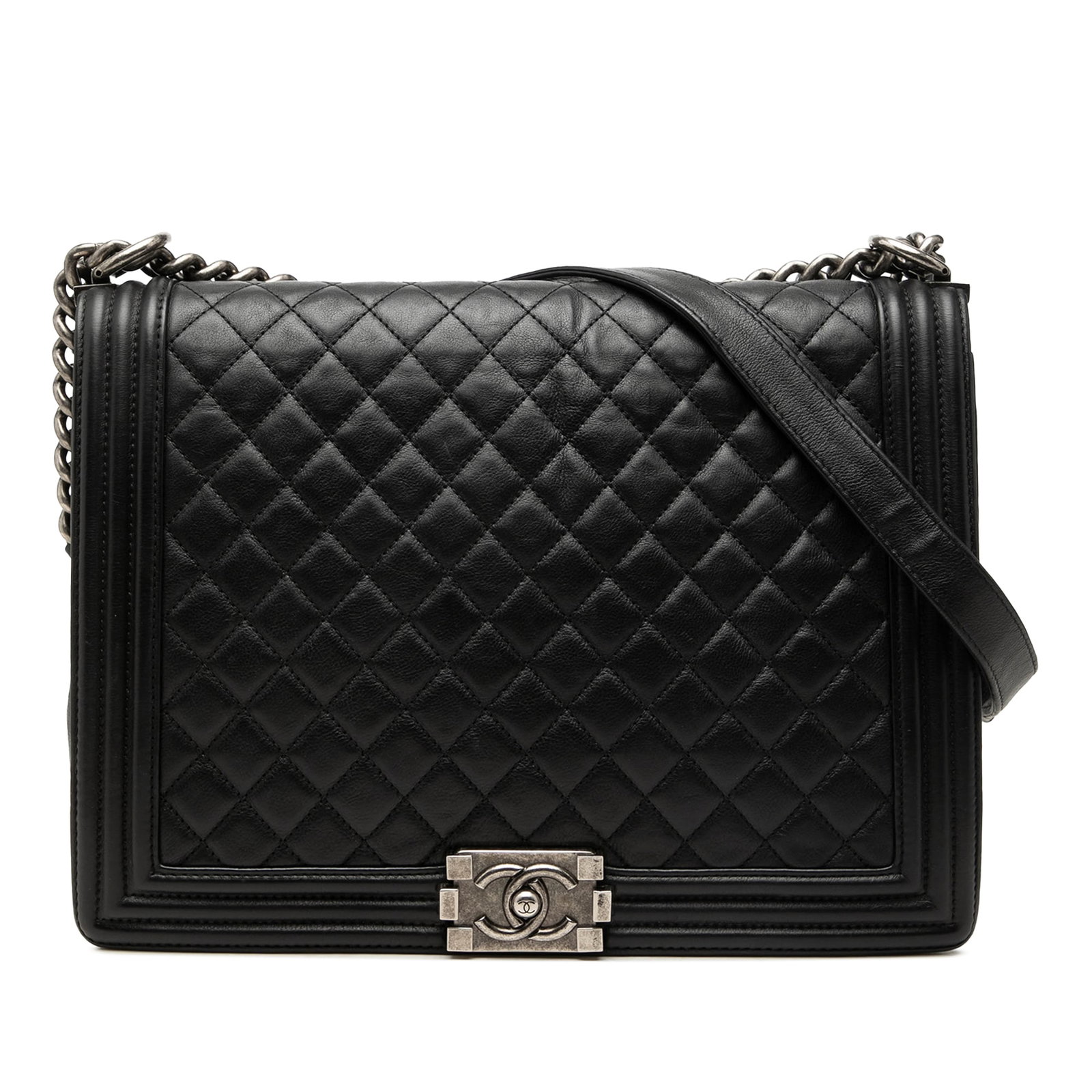 Chanel Boy Flap Large Black Quilted Lambskin Shoulder Bag: Chanel Boy Flap Large Black Quilted Lambskin Shoulder Bag Large Chanel Boy Flap bag crafted in black quilted lambskin leather with a chain link and adjustable flat leather shoulder strap. The design f