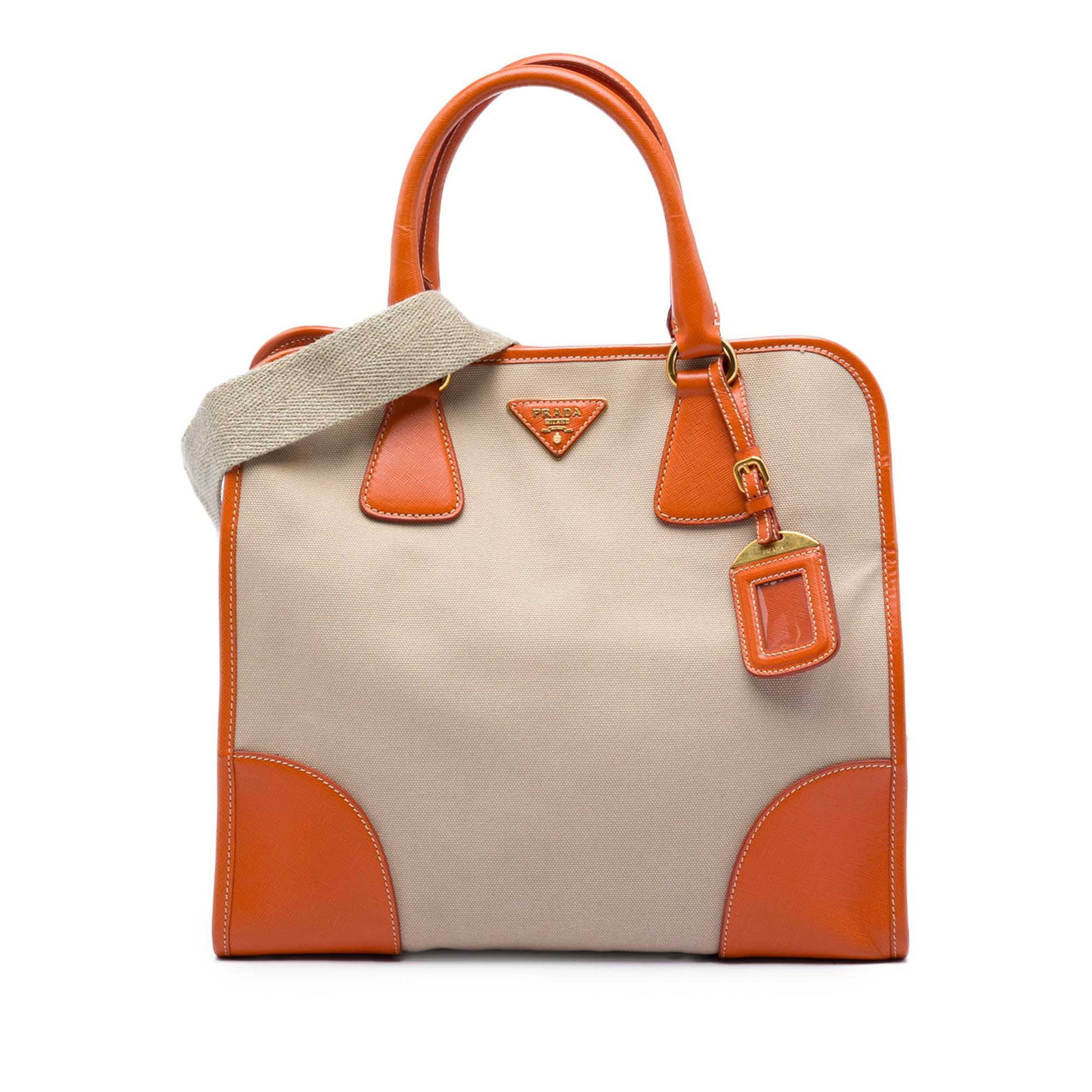 Prada Canapa Satchel in Beige Canvas with Saffiano Trim: Prada Canapa Satchel in Beige Canvas with Saffiano Trim A Prada Canapa satchel crafted with a canvas body and saffiano leather trim. This bag features rolled leather handles, a detachable flat leather