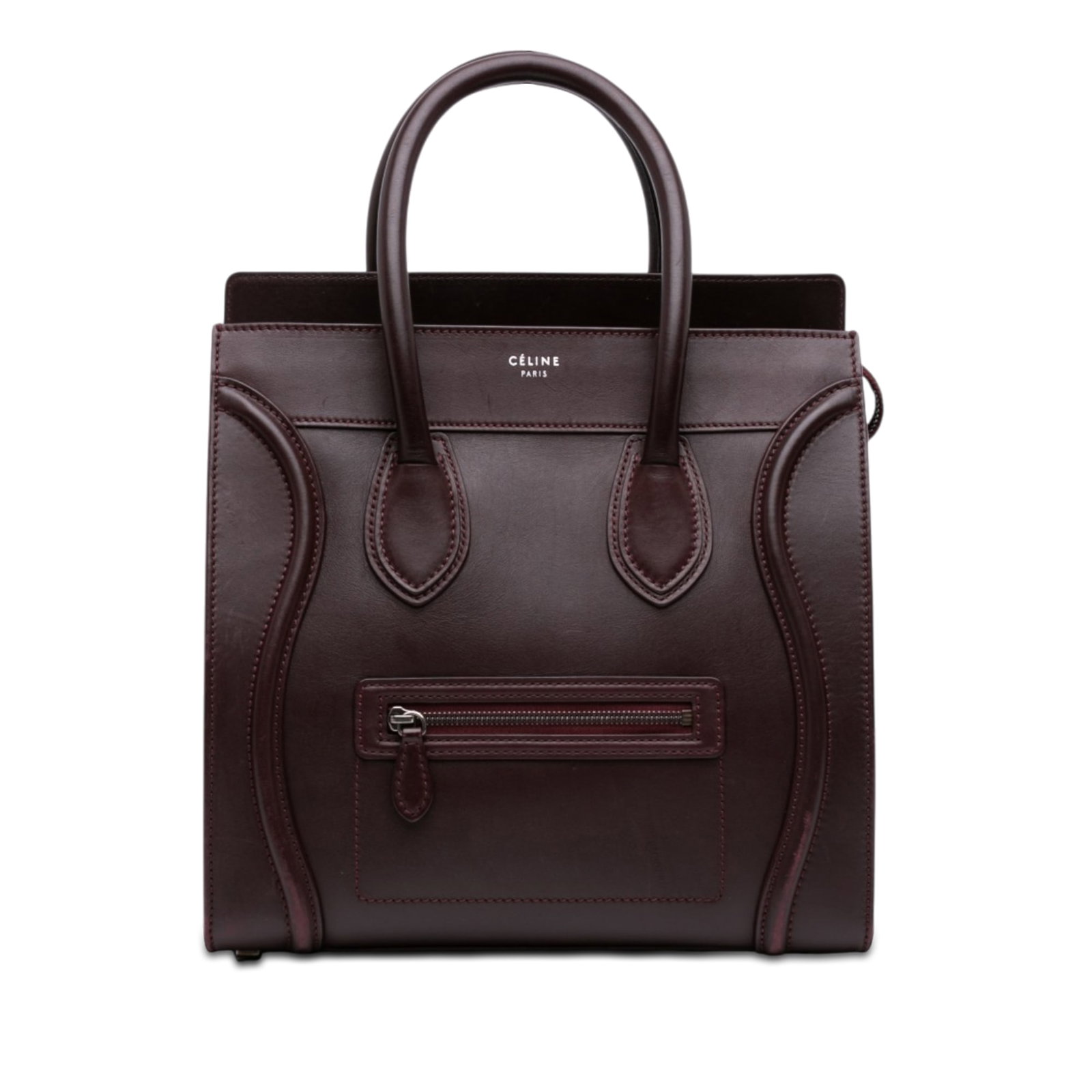 Celine Luggage Tote Mini Smooth Calfskin Leather Handbag Red: Celine Luggage Tote Mini Smooth Calfskin Leather Handbag Red Celine Mini Smooth Calfskin Luggage Tote in red leather with rolled leather handles, a top zip closure, an exterior front zip pocket, and i