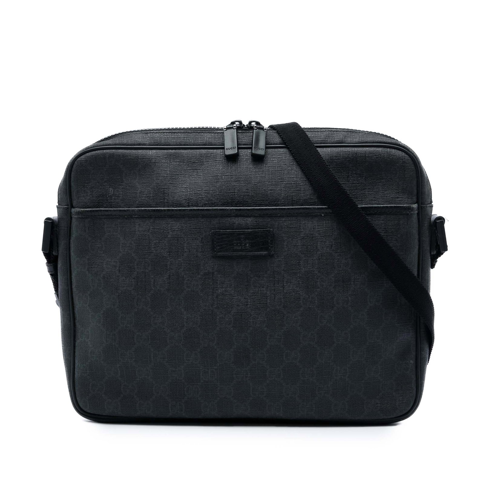 Gucci GG Supreme black coated canvas crossbody bag: Gucci GG Supreme black coated canvas crossbody bag Gucci GG Supreme crossbody bag crafted with a coated canvas body and leather trim. The design includes a flat strap, top zip closure, an exterior fro