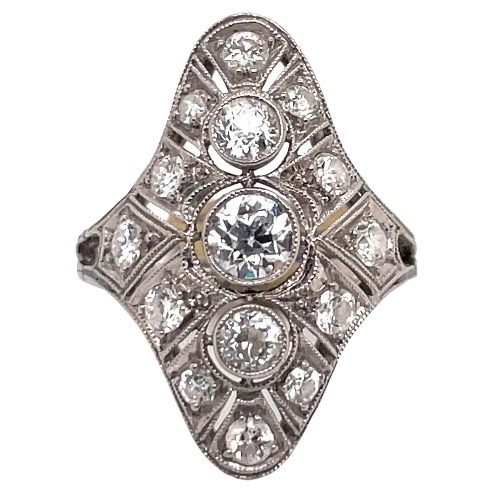 Art Deco Platinum Ring with 3 Round Cut Diamonds 1.20 Carats: Art Deco Platinum Ring with 3 Round Cut Diamonds 1.20 Carats This exquisite Art Deco ring showcases a stunning arrangement of three round-cut diamonds, accentuated by a delicate miligrain design that 