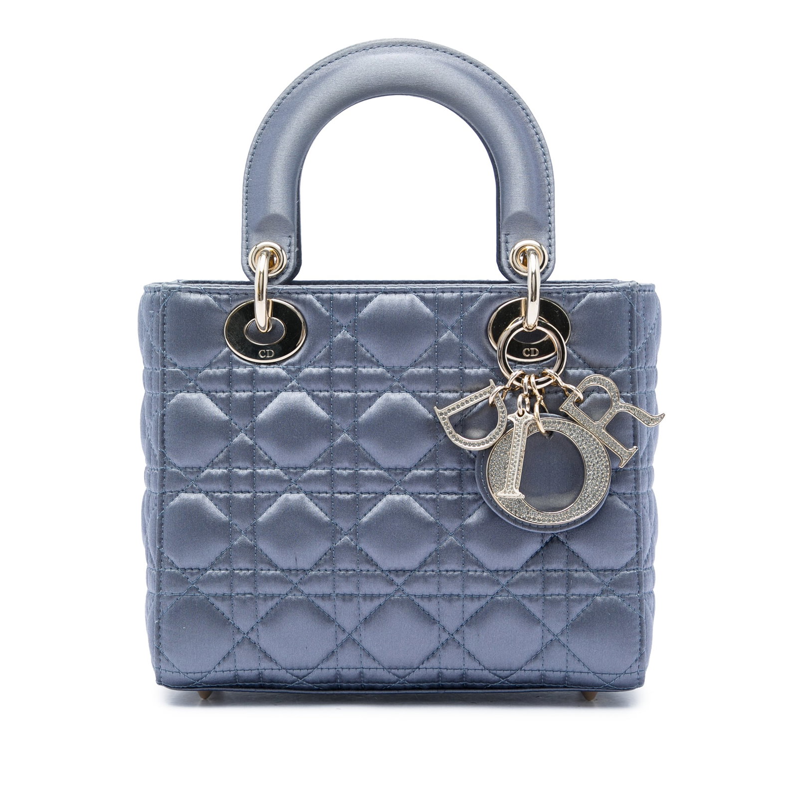 Dior Lady Dior Small Blue Satin Cannage Bag: Dior Lady Dior Small Blue Satin Cannage Bag A small Lady Dior bag crafted in blue quilted satin with Swarovski details and rolled leather handles. The design includes a fold-in flap closure and an int