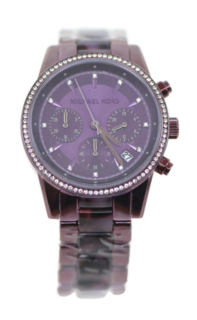 Michael Kors Ritz MK6720 Purple Stainless Steel Watch with Box and Papers: Michael Kors Ritz MK6720 Purple Stainless Steel Watch with Box and Papers Discover the elegance of the Michael Kors Ritz Stainless Steel Watch, model MK6720. This stunning wristwatch features a vibran