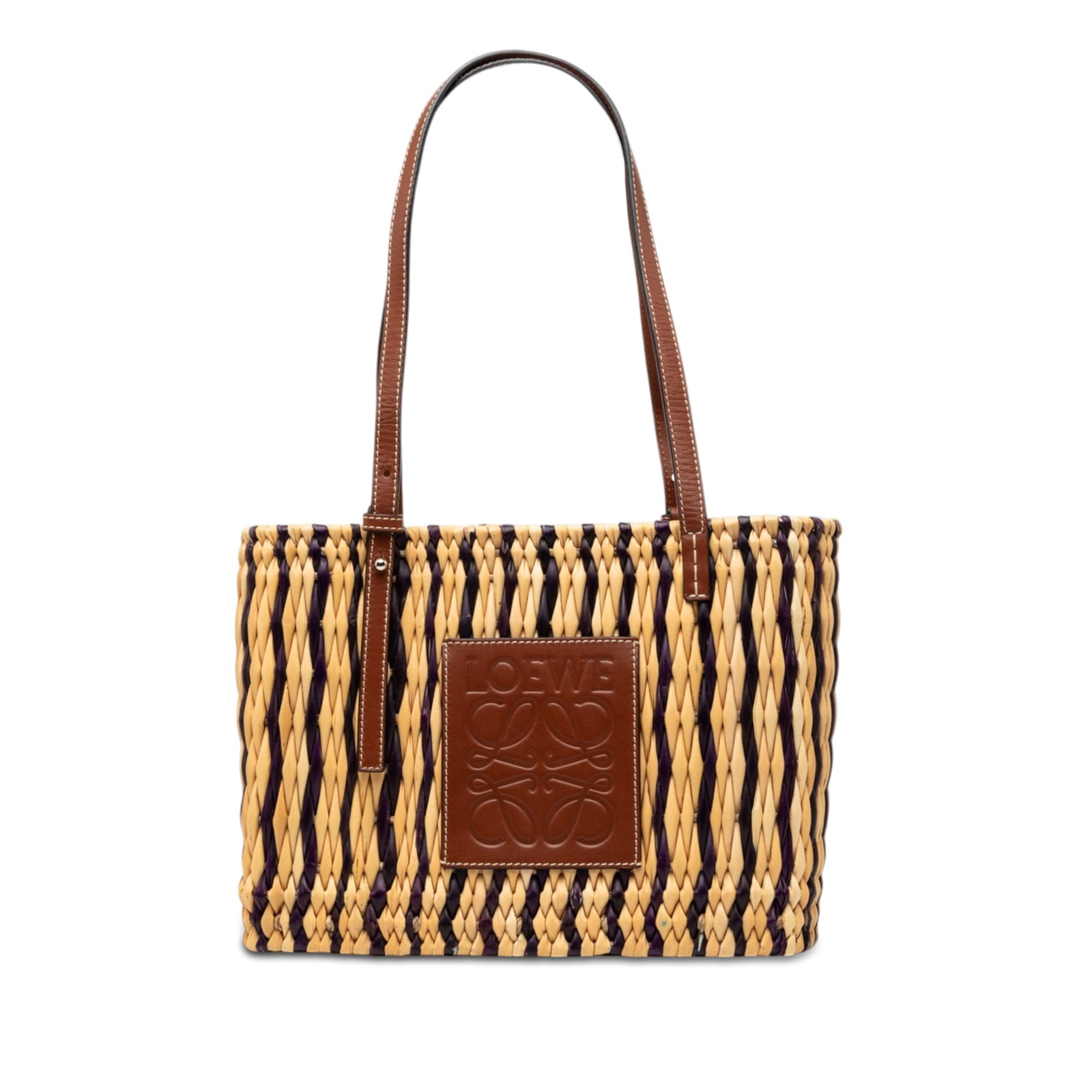 LOEWE Paulas Ibiza Anagram Small Square Raffia Basket Tote: LOEWE Paulas Ibiza Anagram Small Square Raffia Basket Tote Small square basket tote from the LOEWE Paula's Ibiza line, crafted with a raffia body and flat leather straps. The bag has an open-top desig
