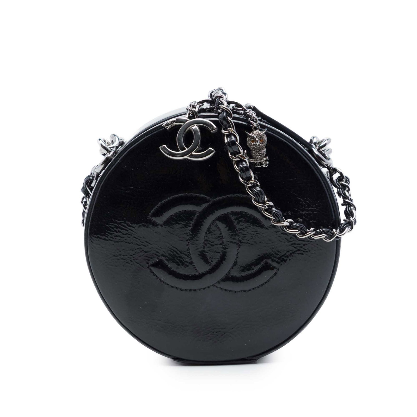 Chanel CC Round as Earth Patent Leather Satchel Bag: Chanel CC Round as Earth Patent Leather Satchel Bag Round Chanel satchel in black patent leather with a zip-around closure. The bag features a curb chain strap, a detachable leather-woven chain should