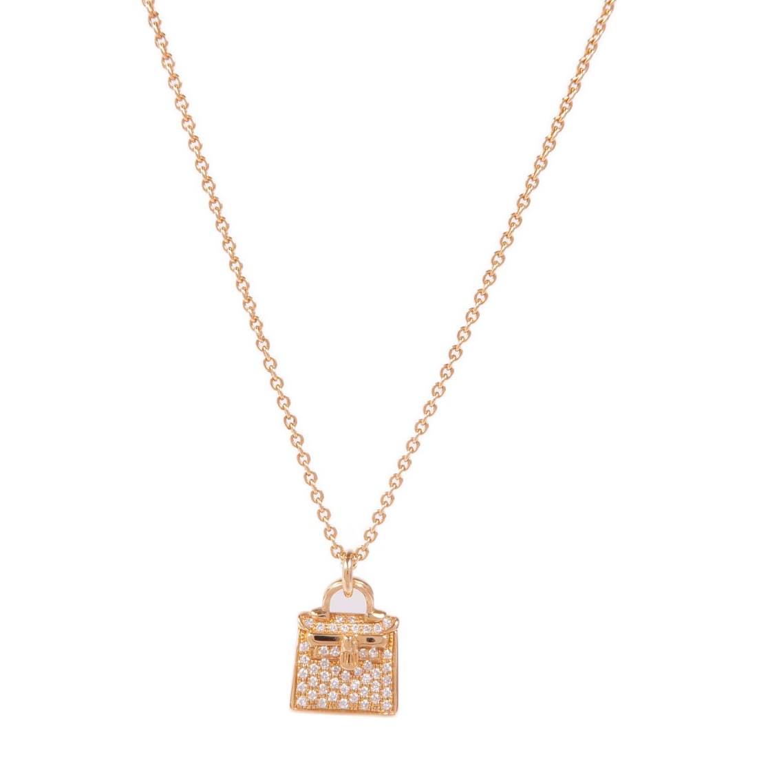 HERMES Kelly diamond necklace in 18K rose gold: HERMES Kelly diamond necklace in 18K rose gold Hermes Kelly pendant necklace in 18K pink gold with a diamond accent. This women's necklace is made in France and features the Kelly motif in a very good