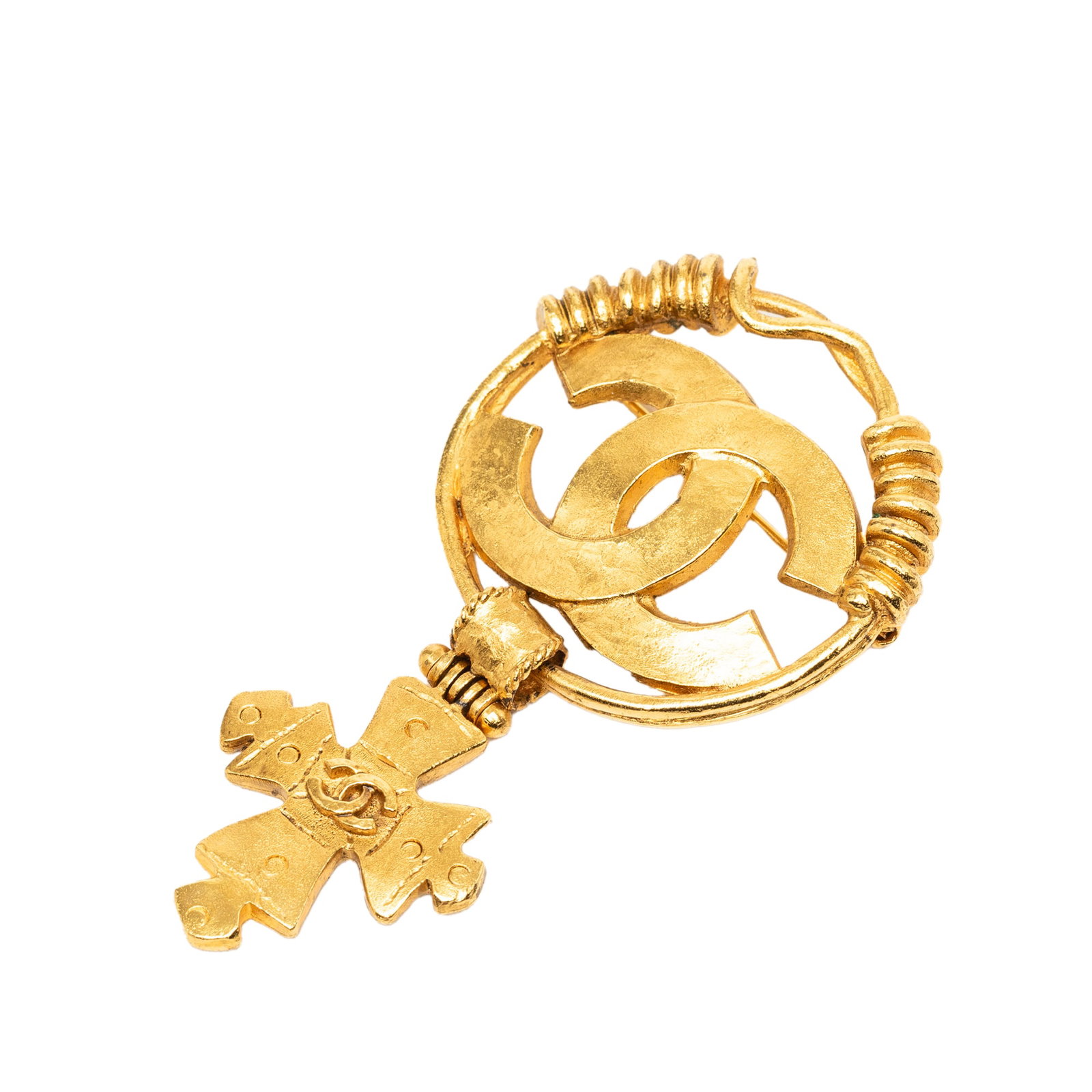 Chanel CC Cross Brooch Gold Tone Metal: Chanel CC Cross Brooch Gold Tone Metal Chanel CC cross brooch in gold-tone metal with a back pin closure. Made in France, this costume jewelry piece includes the box. Condition is B+ with discoloratio