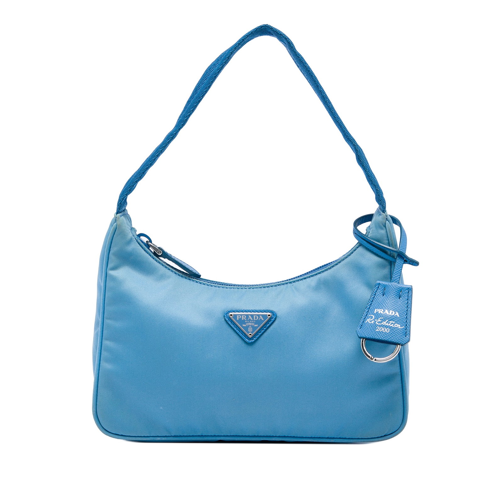 Prada Re Edition 2000 Mini Tessuto Blue Nylon Shoulder Bag: Prada Re Edition 2000 Mini Tessuto Blue Nylon Shoulder Bag Prada Mini Tessuto Re Edition 2000 shoulder bag in blue fabric with a compact silhouette, flat shoulder strap, and top zip closure. Made in I