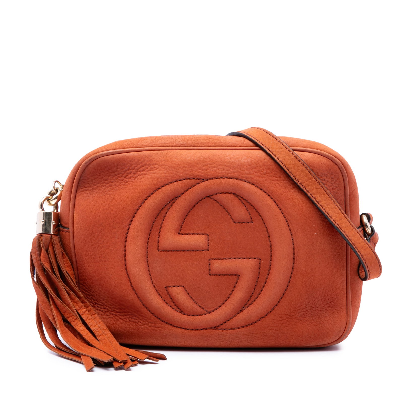 Gucci Soho Disco Nubuck Leather Crossbody Bag Orange: Gucci Soho Disco Nubuck Leather Crossbody Bag Orange Gucci Soho Disco crossbody bag in orange nubuck leather with a tassel detail and top zip closure. This compact design features an adjustable flat l
