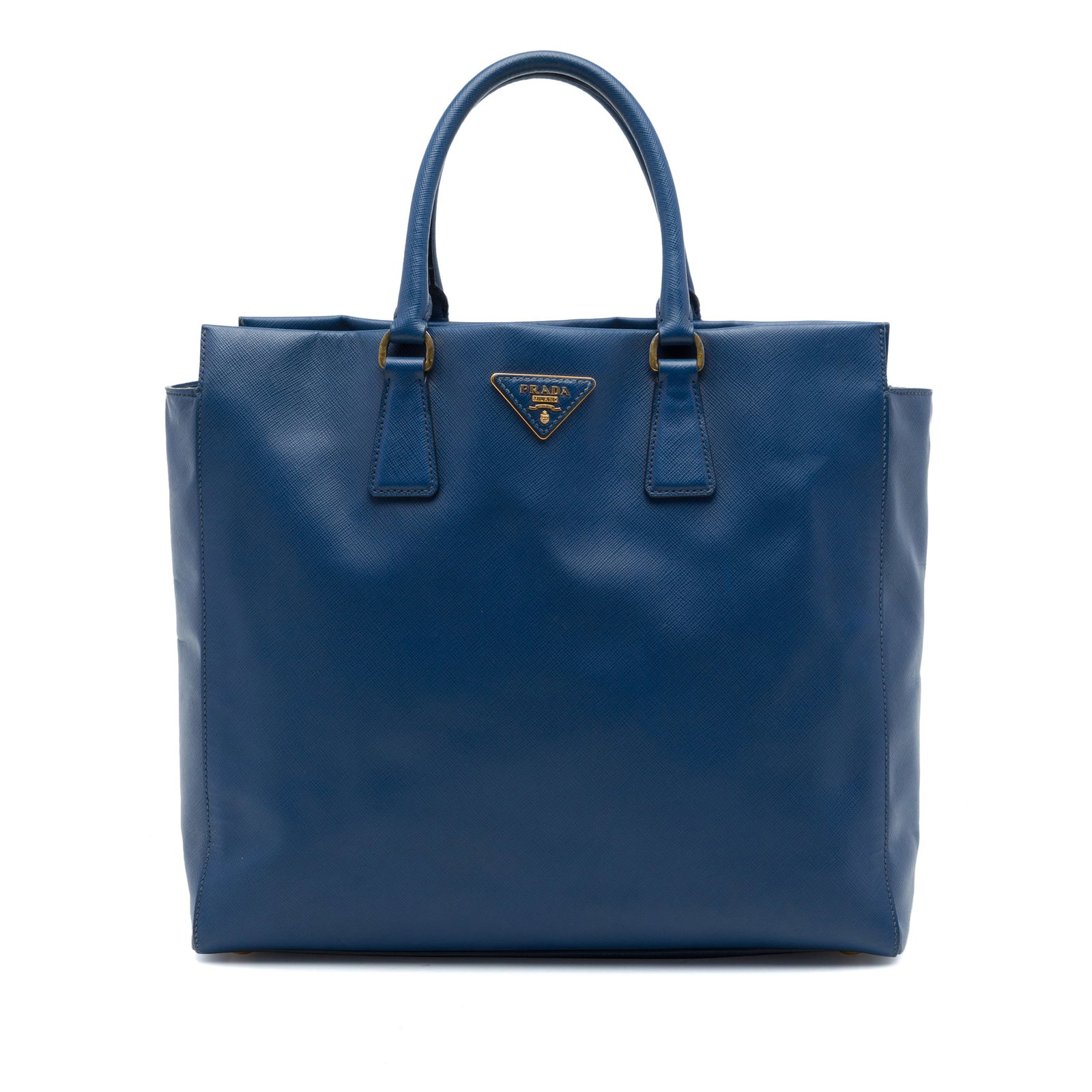 Prada Saffiano Lux Convertible Tote Blue Leather Satchel: Prada Saffiano Lux Convertible Tote Blue Leather Satchel Prada Saffiano Lux Open Convertible Tote in blue saffiano leather. This satchel-style bag features rolled leather handles, an open top, and an 