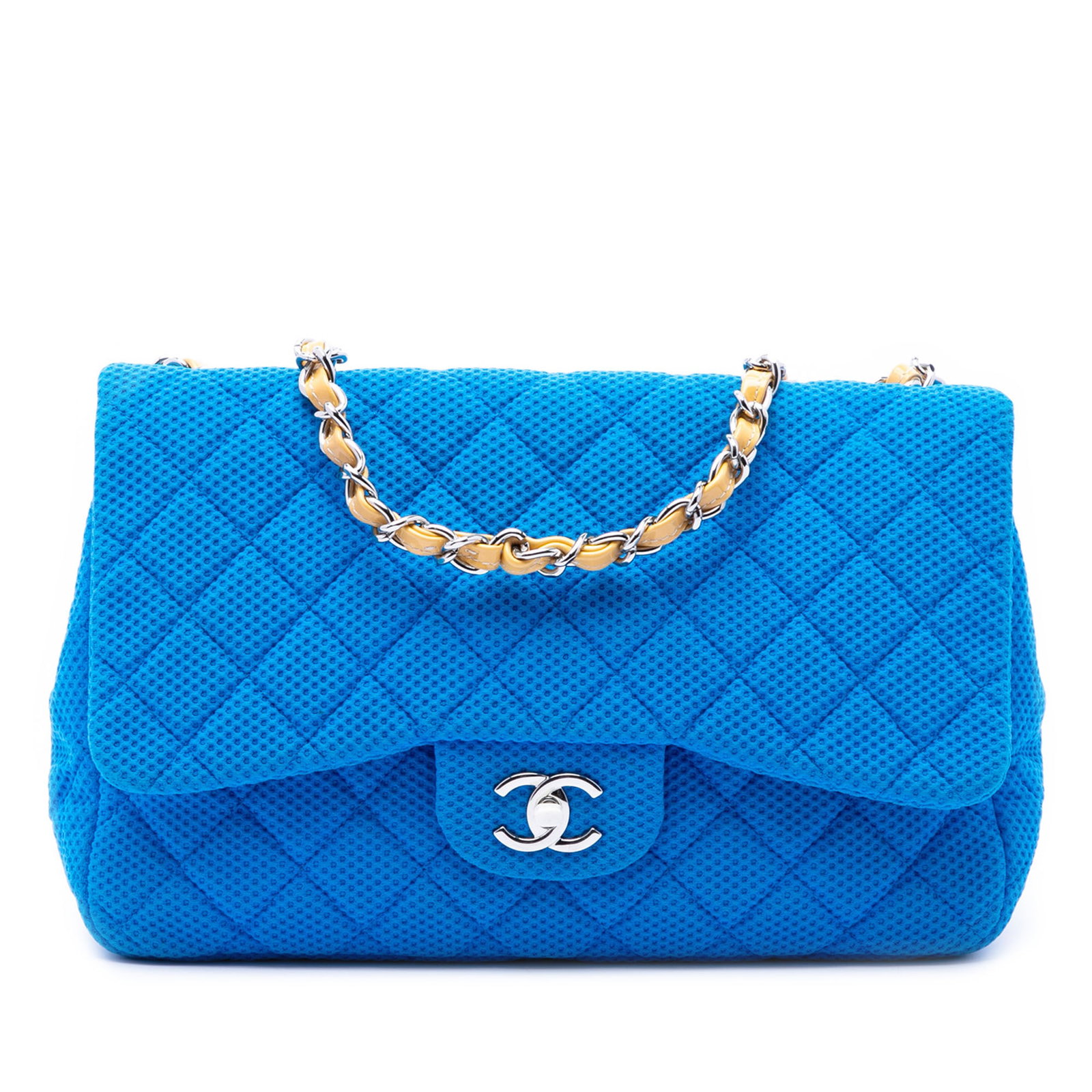 Chanel Jumbo Classic Single Flap Bag in Blue Perforated Jersey: Chanel Jumbo Classic Single Flap Bag in Blue Perforated Jersey A Chanel Jumbo Classic Single Flap bag crafted in blue perforated jersey. This shoulder bag features leather-woven chain link straps, a f
