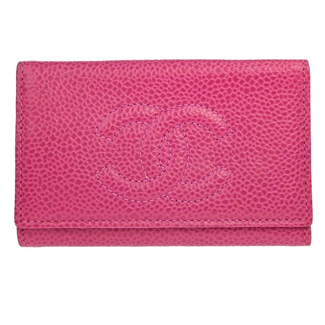 CHANEL Caviar Skin Leather 6 Hook Key Case Pink: CHANEL Caviar Skin Leather 6 Hook Key Case Pink Compact Chanel six-hook key case in pink caviar skin leather with a button logo accent. This vintage piece includes a serial sticker and shows overall v