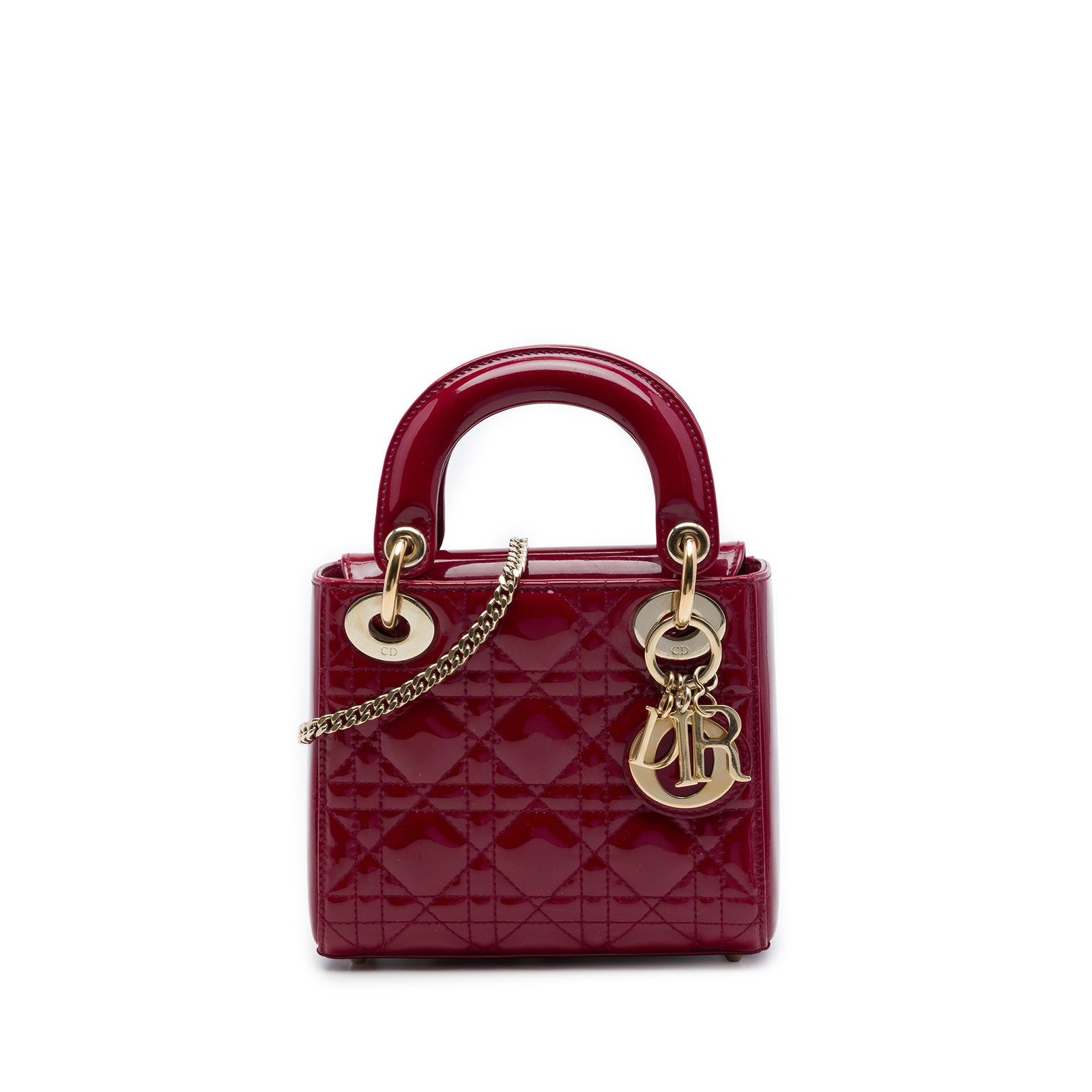 Dior Lady Dior Mini Patent Leather Cannage Bag Red: Dior Lady Dior Mini Patent Leather Cannage Bag Red A compact Lady Dior handbag crafted in red patent leather with the signature Cannage quilted design. This mini bag features flat top handles, a detac