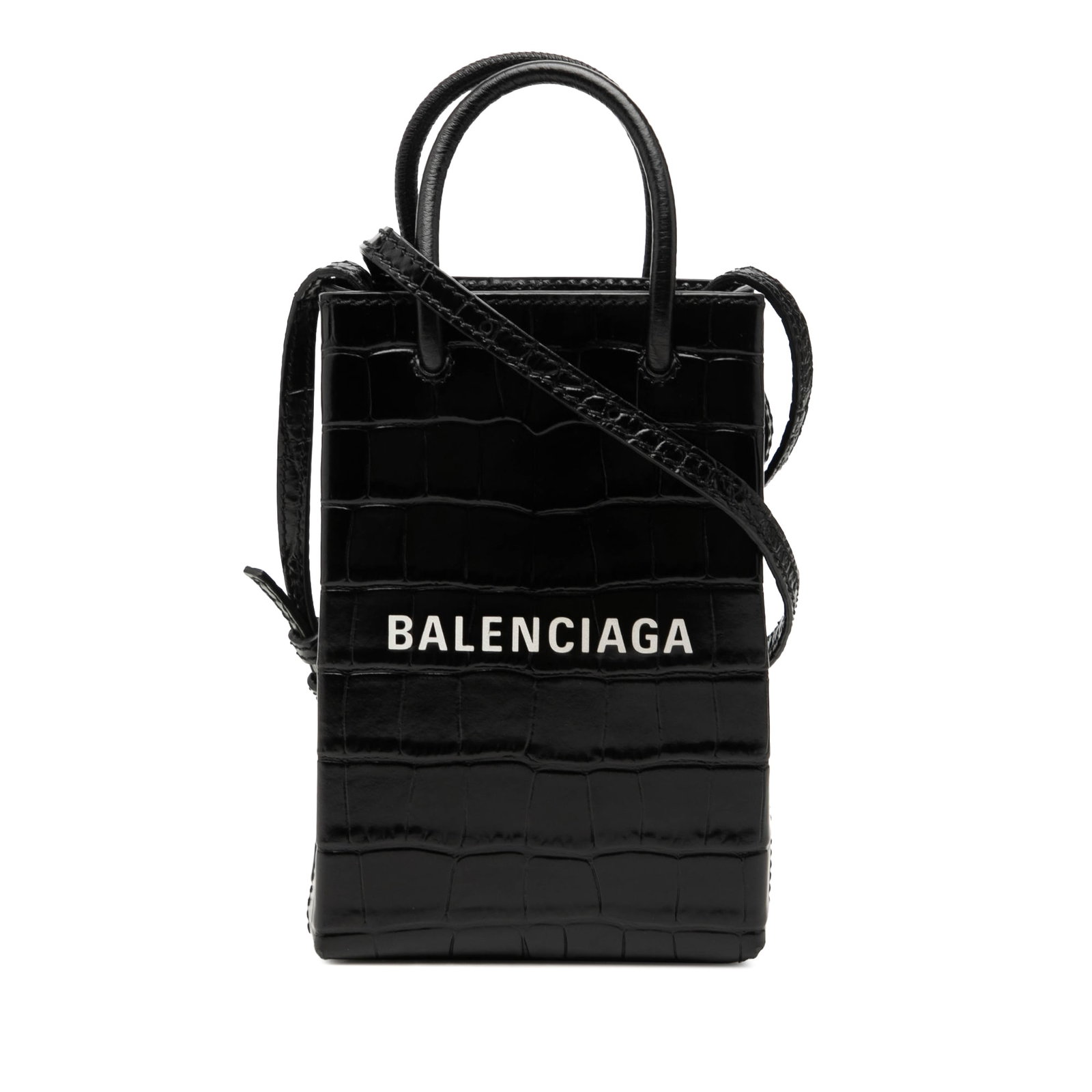 Balenciaga Mini Shopping Phone Holder in Black Croc Embossed Leather: Balenciaga Mini Shopping Phone Holder in Black Croc Embossed Leather Compact and structured, this Balenciaga Mini Croc Embossed Leather Shopping Phone Holder is crafted in black embossed leather with 