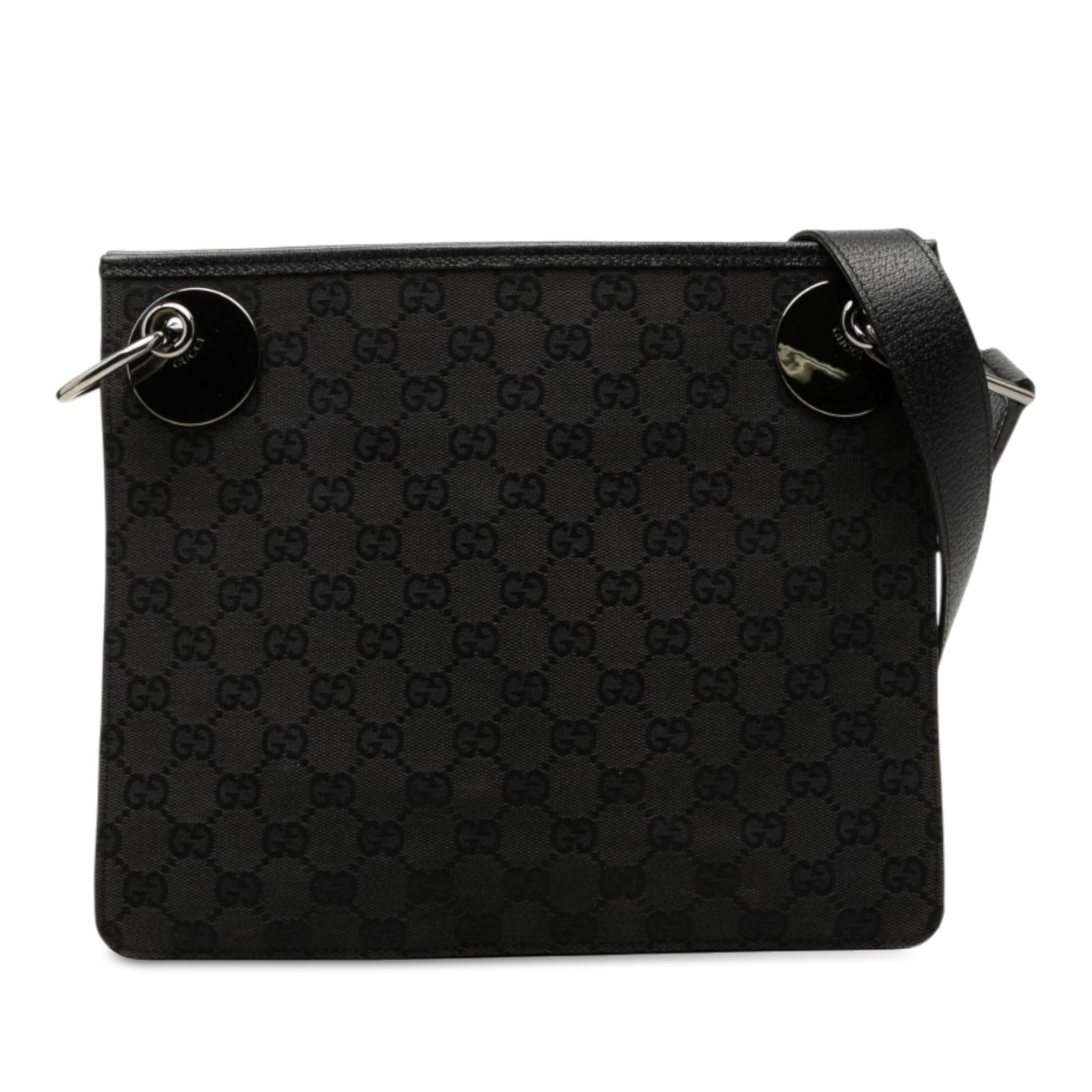 Gucci Eclipse Crossbody Bag in Black GG Canvas: Gucci Eclipse Crossbody Bag in Black GG Canvas Gucci GG Canvas Eclipse Crossbody bag in black canvas with leather trim. This crossbody style features an adjustable flat leather strap, open top, and an