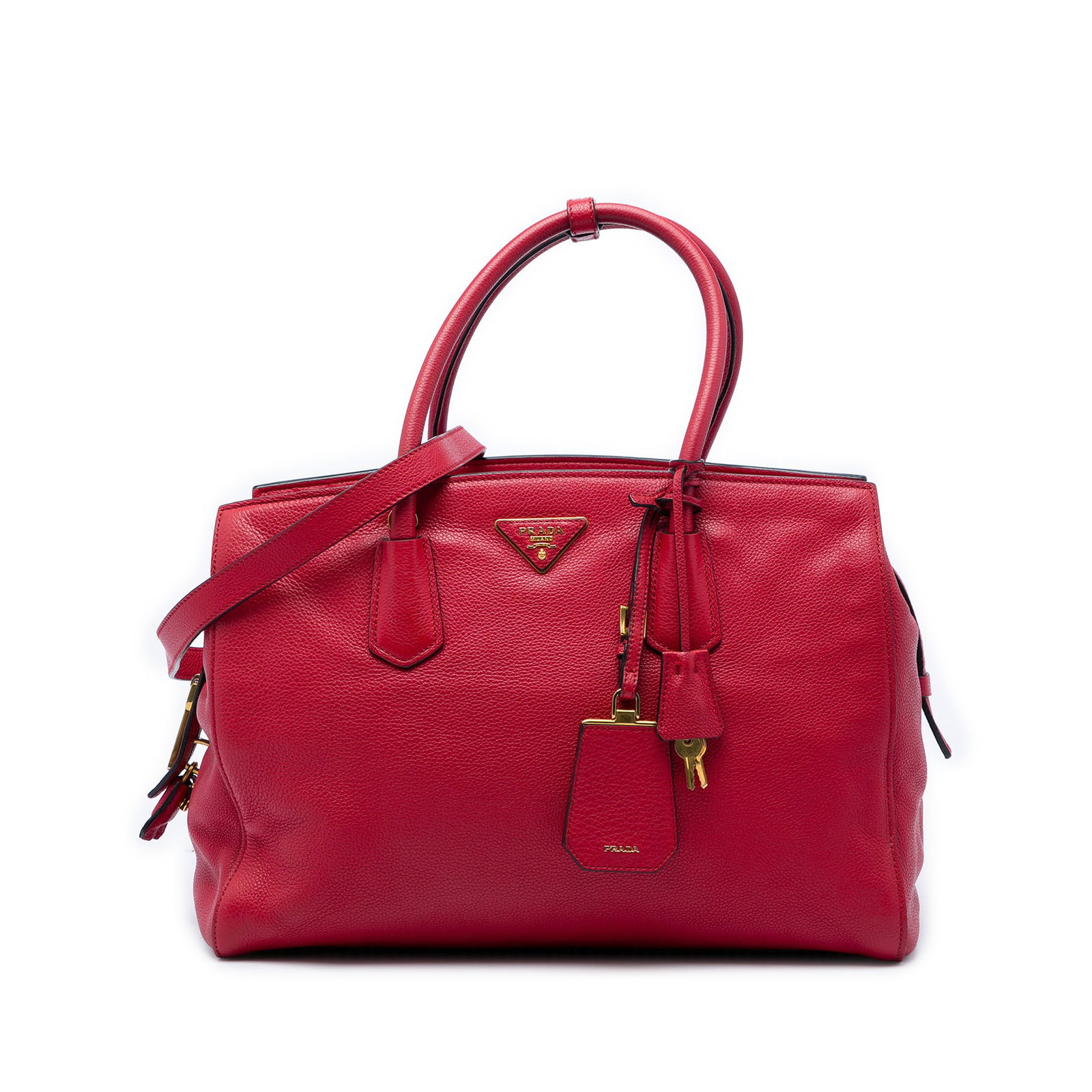 Prada Vitello Daino leather satchel with shoulder strap: Prada Vitello Daino leather satchel with shoulder strap A Prada Vitello Daino Zip Top Convertible Tote in red leather with rolled top handles, a detachable flat leather shoulder strap, top zip closure