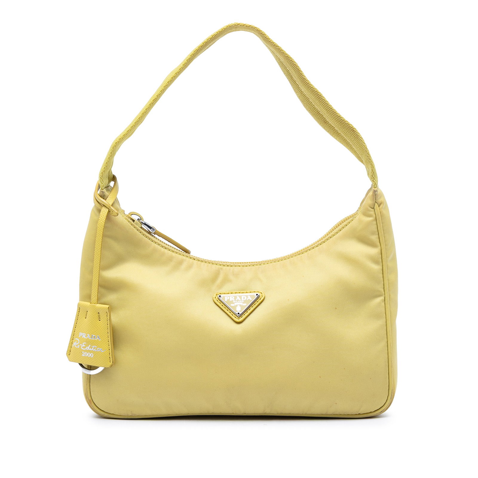 Prada Re Edition 2000 Mini Tessuto Nylon Shoulder Bag Yellow: Prada Re Edition 2000 Mini Tessuto Nylon Shoulder Bag Yellow Prada Mini Tessuto Re Edition 2000 shoulder bag in yellow with a nylon body, flat shoulder strap, and top zip closure. Made in Italy.