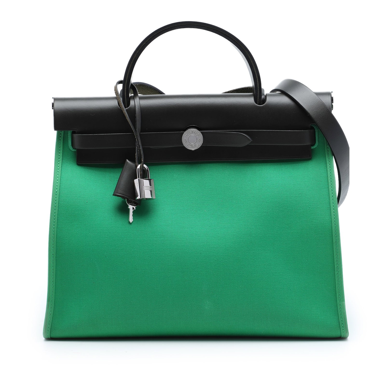 Hermes Toile Herbag Zip 31 Green Canvas Shoulder Bag: Hermes Toile Herbag Zip 31 Green Canvas Shoulder Bag The Hermes Herbag Zip 31 is a structured bag crafted with a canvas body and leather trim. It features a flat leather top handle, a flat leather sho