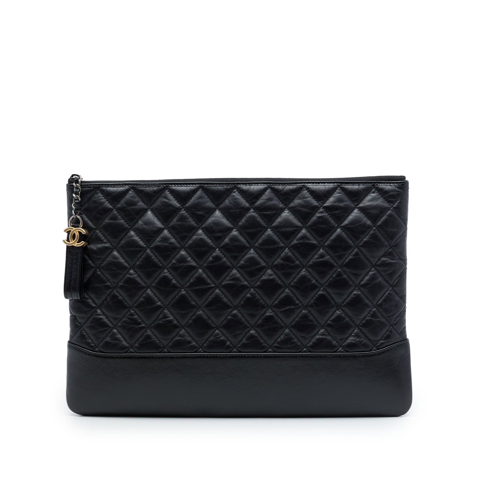 Chanel Gabrielle O Case Large Black Aged Calfskin Clutch: Chanel Gabrielle O Case Large Black Aged Calfskin Clutch A Chanel Gabrielle O Case clutch in black aged calfskin with a streamlined silhouette and top zip closure. Made in Italy, this large clutch inc