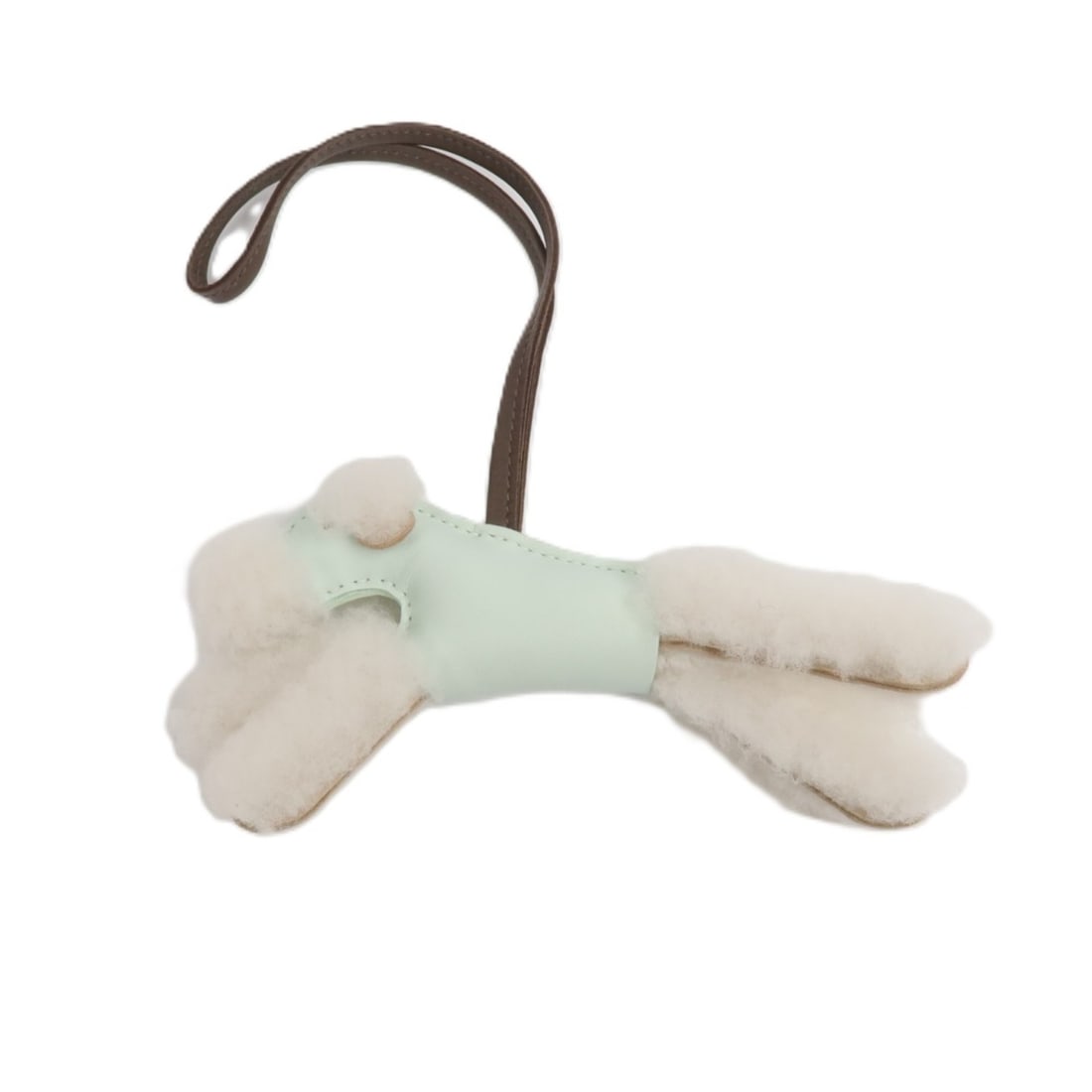 Hermes Budy bag charm in lambskin and wool Vert Fizz: Hermes Budy bag charm in lambskin and wool Vert Fizz Hermes Budy charm in Milo lambskin and wool with a Vert Fizz and white color combination. Made in France, this women's accessory includes a storage