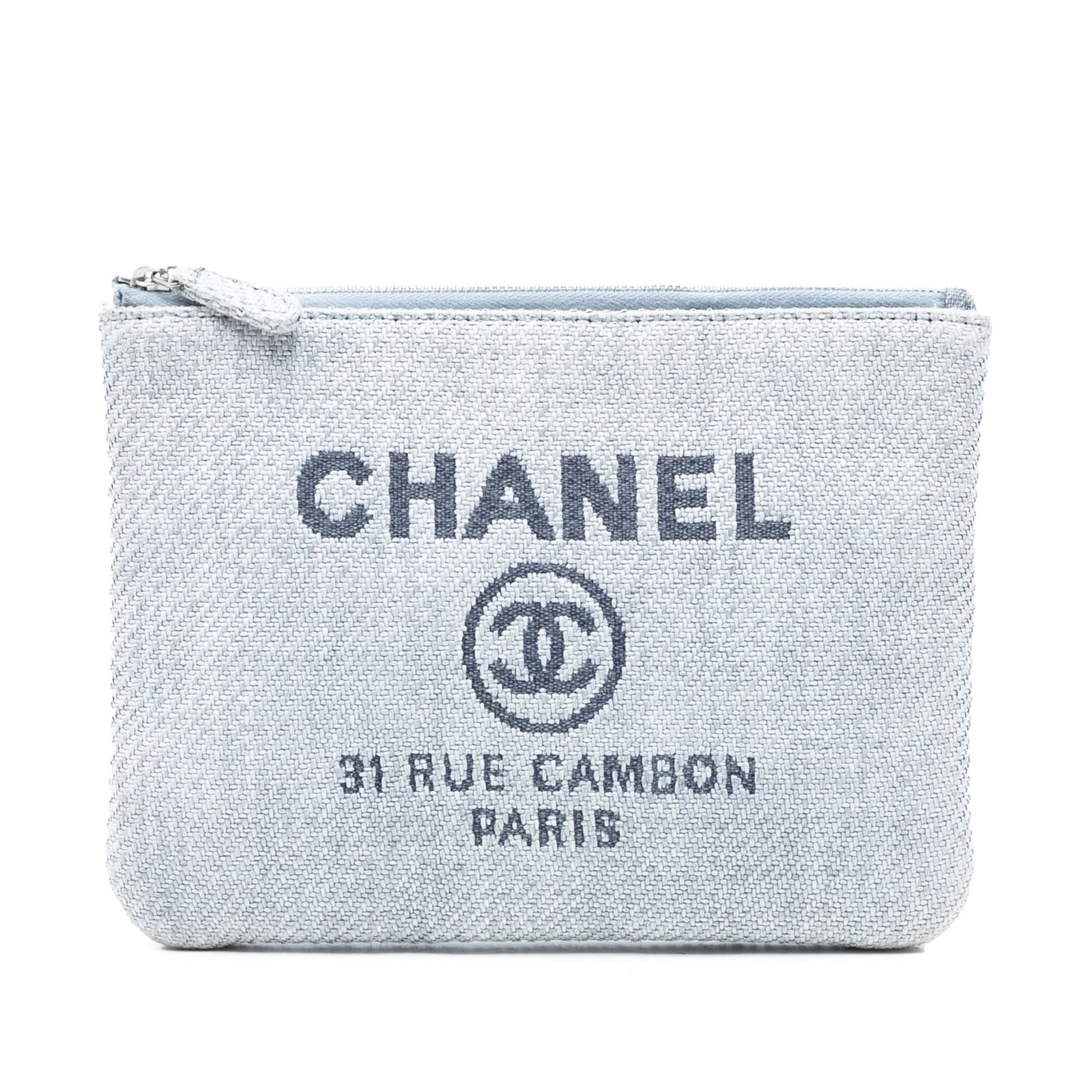 Chanel Deauville O Case Small Denim Zip Clutch: Chanel Deauville O Case Small Denim Zip Clutch A Chanel Small Denim Deauville O Case Clutch in blue fabric with a zip-top closure. Made in Italy, this compact clutch offers a slim profile suitable for