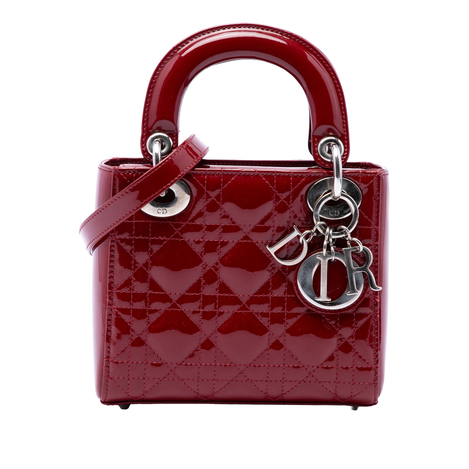 Dior Lady Dior Mini Cannage Patent Leather Bag Red: Dior Lady Dior Mini Cannage Patent Leather Bag Red A compact Dior Lady Dior bag in red patent leather with the signature Cannage quilted design. This mini bag features flat top handles, a detachable f