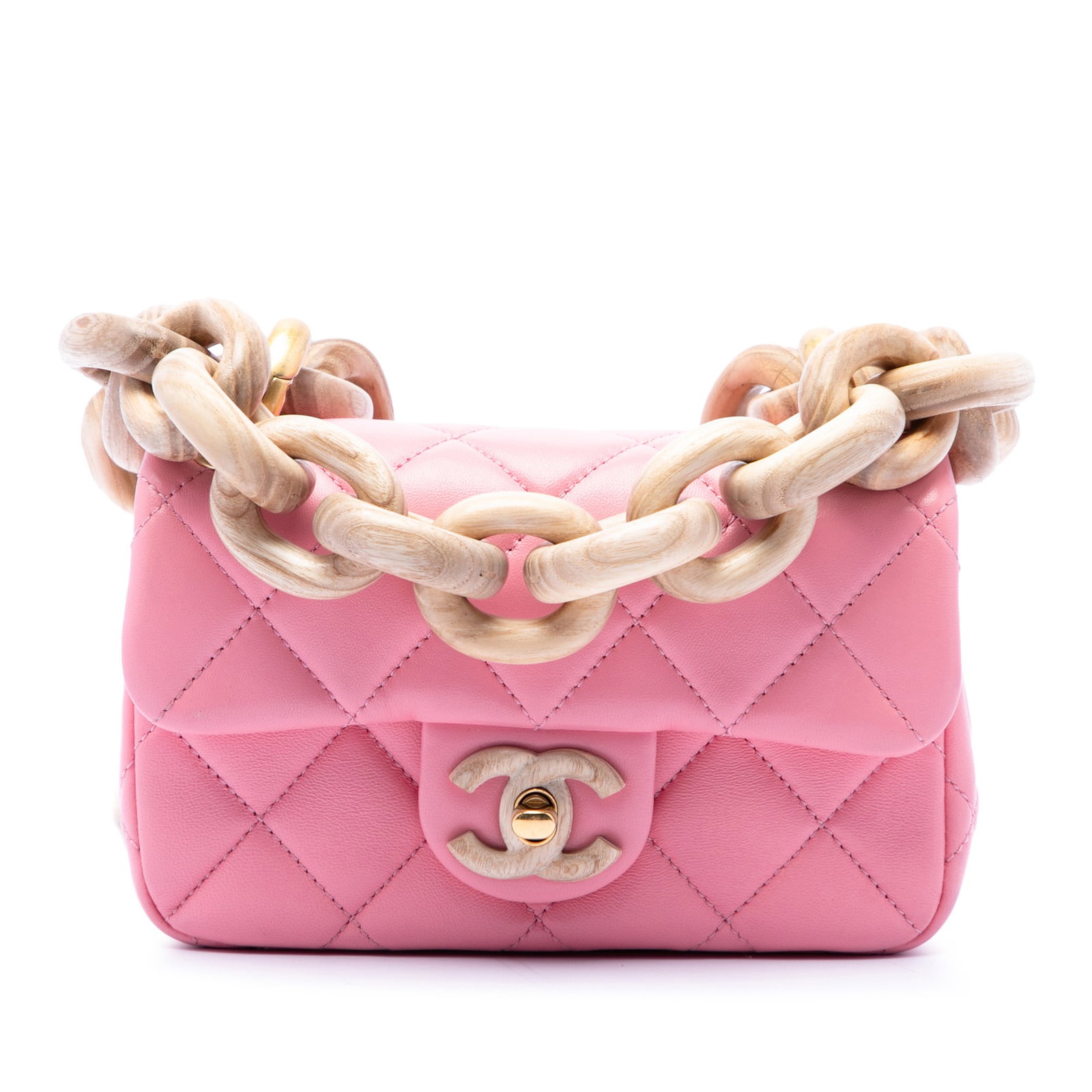 Chanel Mini Wenge Wood Chain Flap Pink Lambskin Crossbody Bag: Chanel Mini Wenge Wood Chain Flap Pink Lambskin Crossbody Bag A compact Chanel crossbody bag crafted with a quilted lambskin leather body and a distinctive wooden chain strap. The design features a to