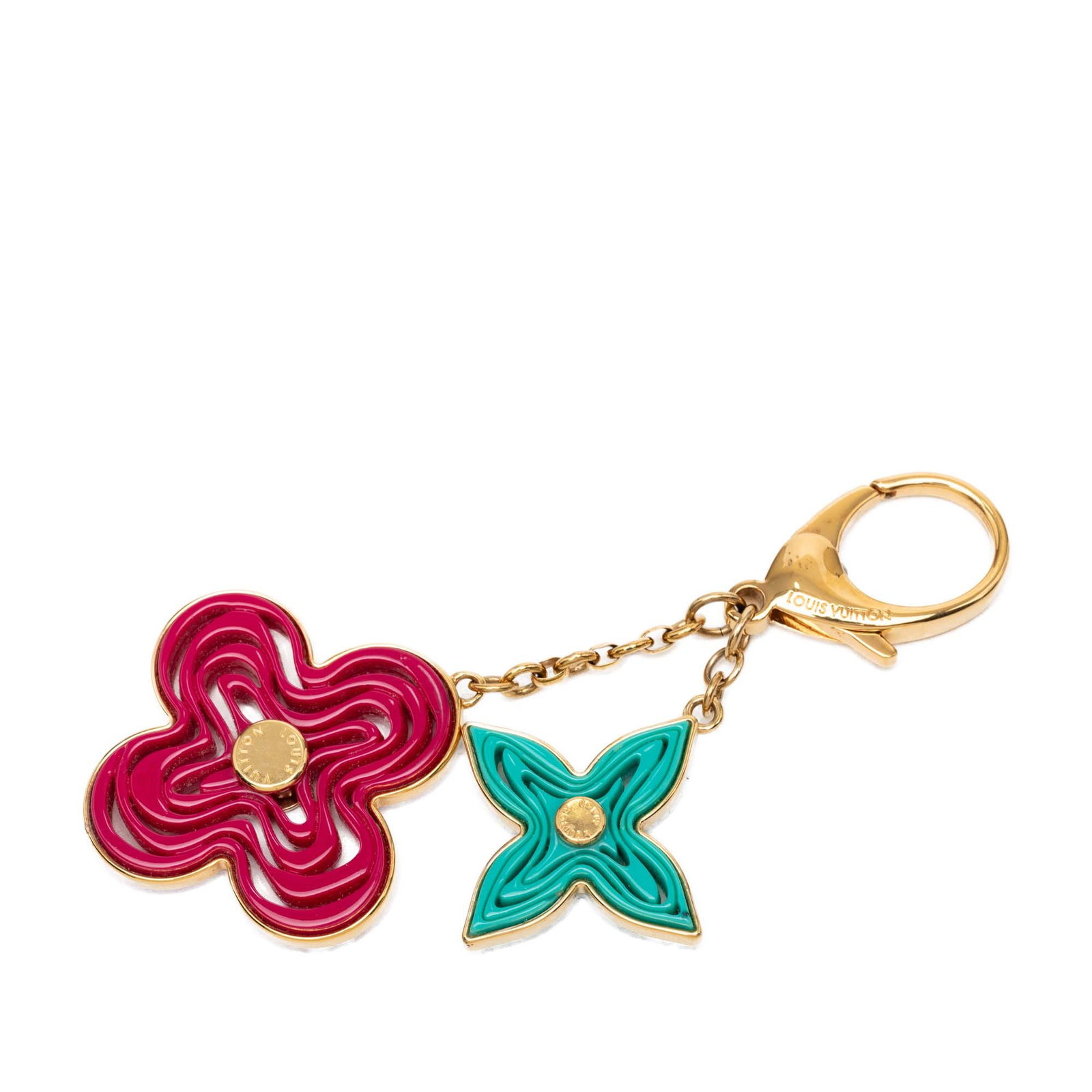 Louis Vuitton Naif Gold Tone Resin Bag Charm: Louis Vuitton Naif Gold Tone Resin Bag Charm This Louis Vuitton Naif bag charm is crafted from gold-tone metal and resin, featuring a lobster clasp closure for secure attachment. The accessory is desi
