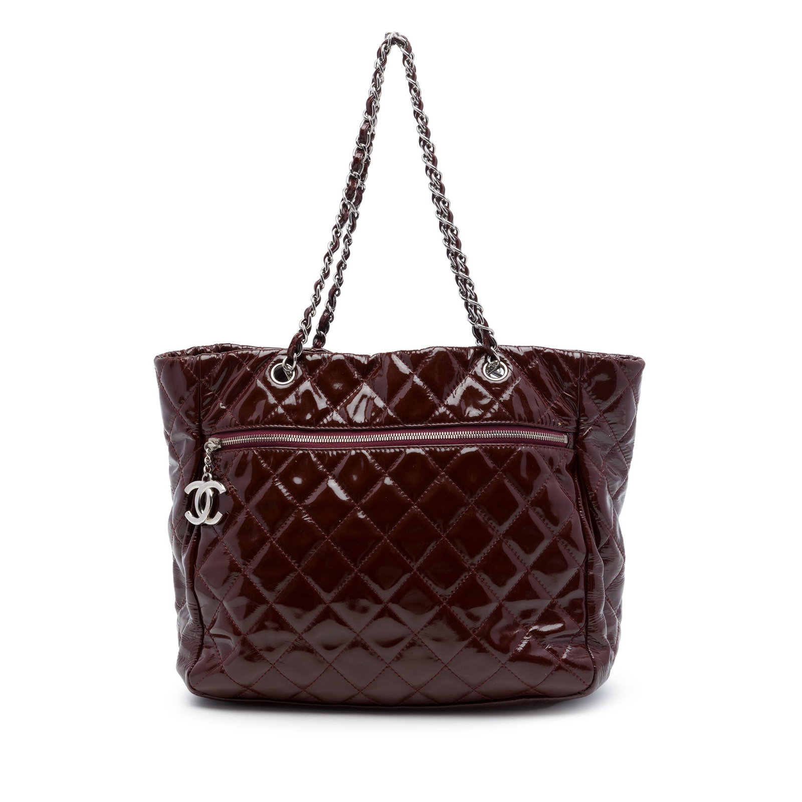 Chanel Chic and Glitter Ligne Quilted Patent Leather Tote: Chanel Chic and Glitter Ligne Quilted Patent Leather Tote A Chanel tote crafted in red quilted patent leather with leather-woven chain link straps and an open top with magnetic snap closure. The desig