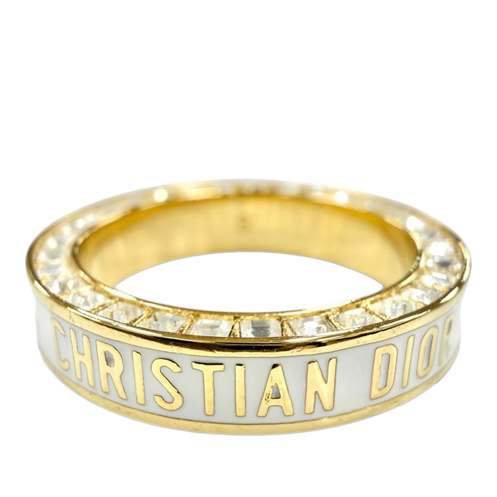 Dior Night Code Band Ring Gold Plated Strass White Lacquer: Dior Night Code Band Ring Gold Plated Strass White Lacquer Dior Night Code band ring in gold plated metal with crystals and white lacquer details. This costume jewelry piece is made in Italy and inclu