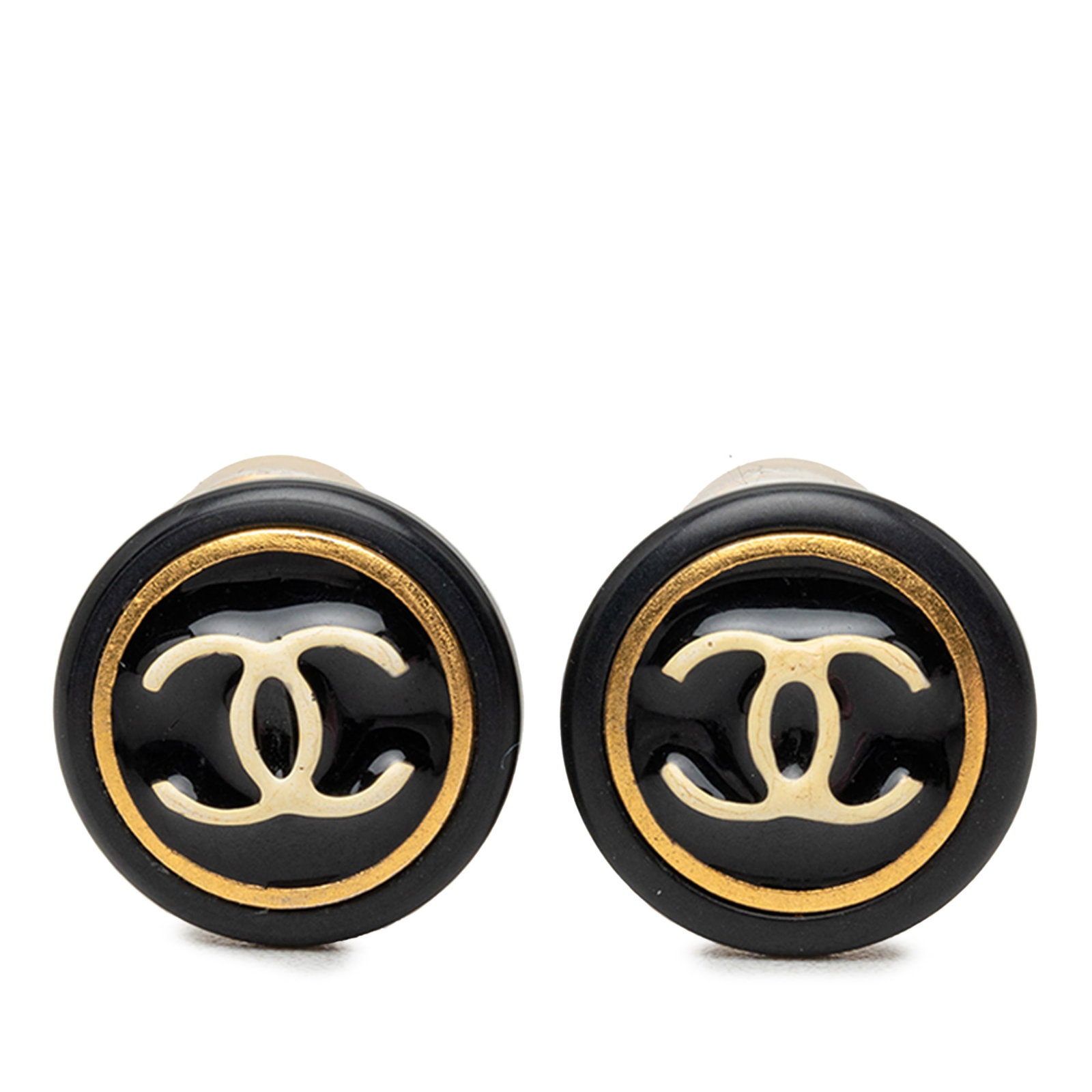 Chanel CC Button Clip Earrings Gold Plated Resin Black: Chanel CC Button Clip Earrings Gold Plated Resin Black Chanel CC button clip-on earrings crafted with resin and gold plated brass. These costume earrings are made in France and feature a classic black