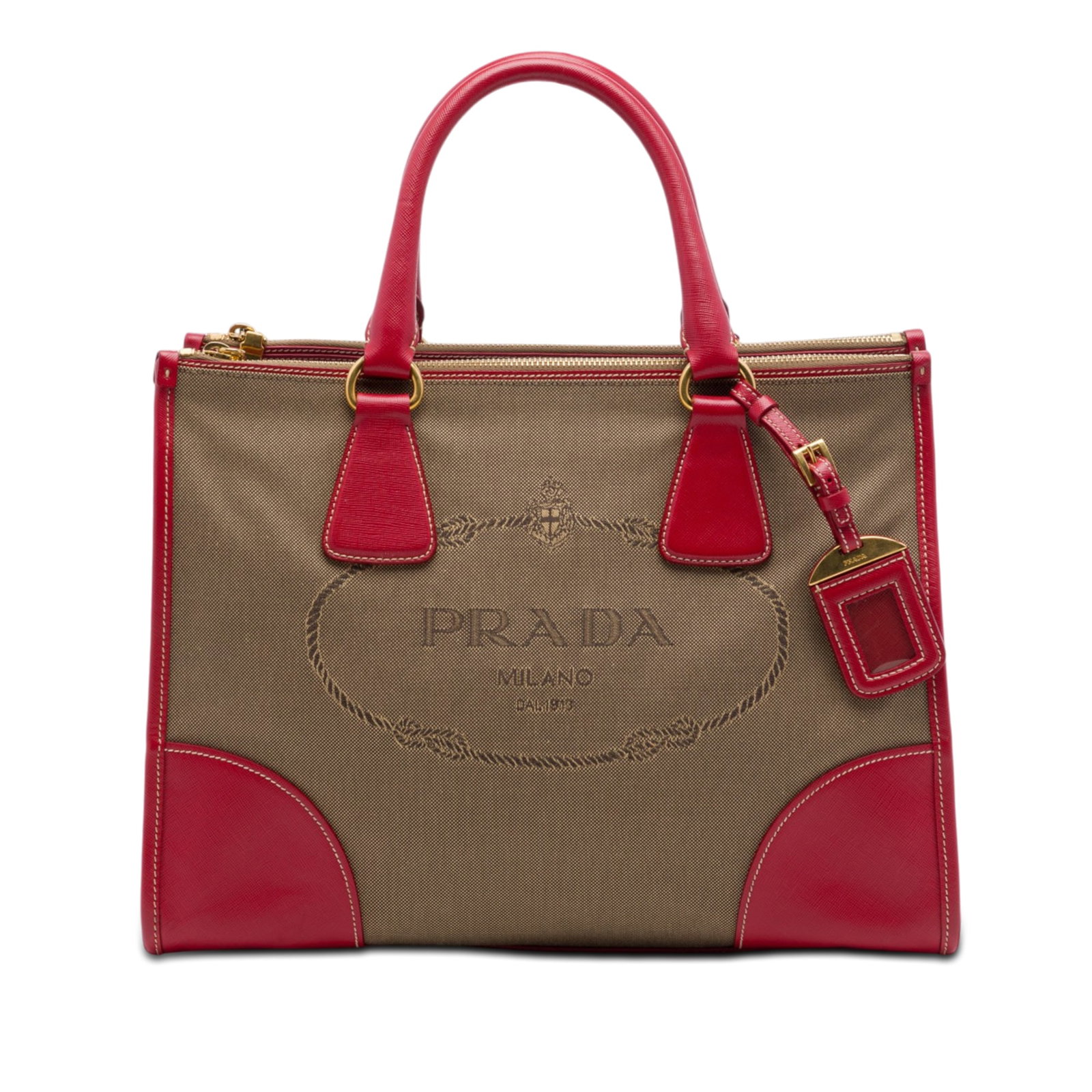 Prada Canapa Double Zip Satchel in Brown Canvas with Saffiano Trim: Prada Canapa Double Zip Satchel in Brown Canvas with Saffiano Trim Prada Canapa satchel with a canvas body and saffiano leather trim. The design features rolled leather handles, an open top with side 