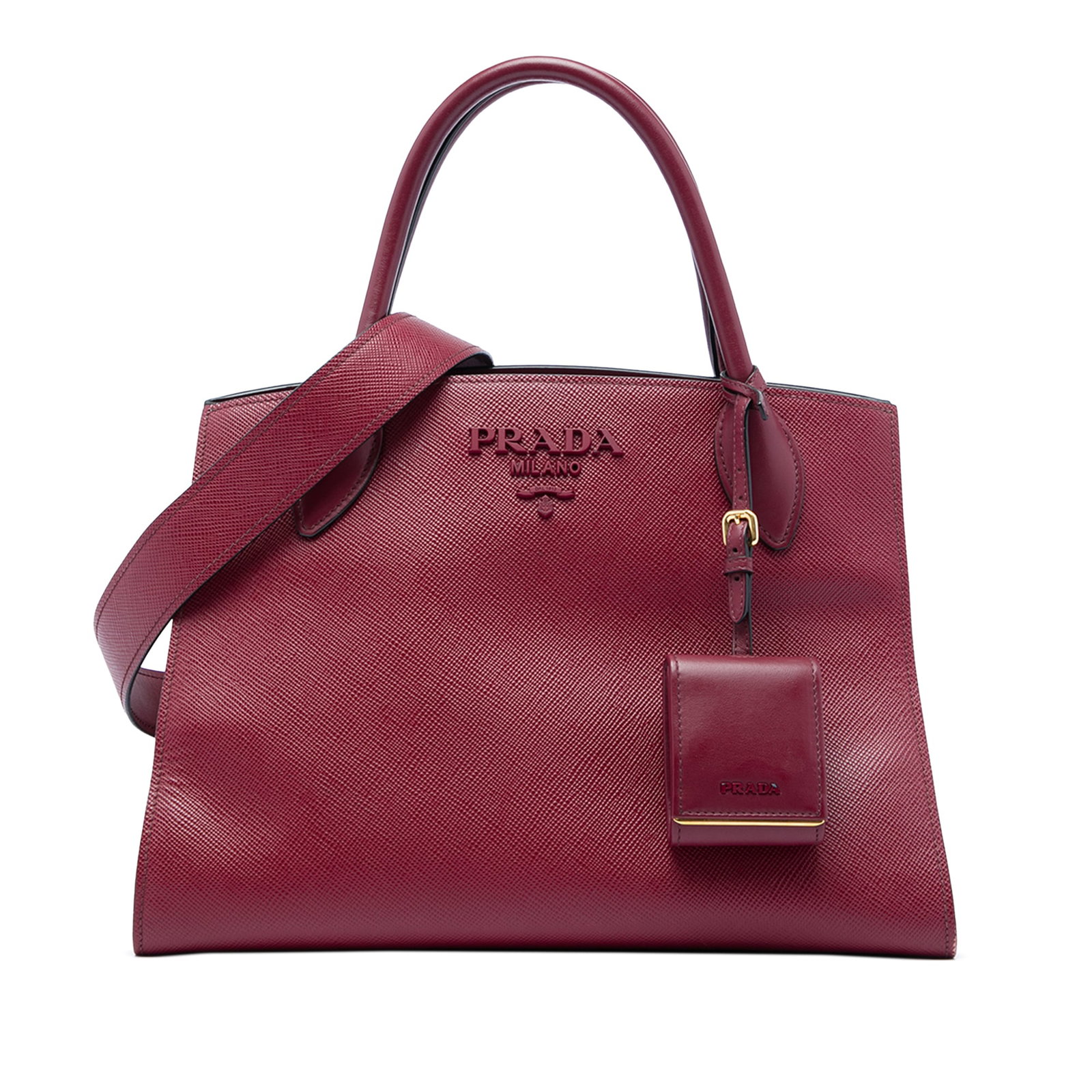 Prada Monochrome Medium Saffiano Cuir Leather Satchel Red: Prada Monochrome Medium Saffiano Cuir Leather Satchel Red Prada Medium Saffiano Cuir Monochrome Top Handle Tote in red leather with rolled top handles and a detachable flat leather strap. The bag feat
