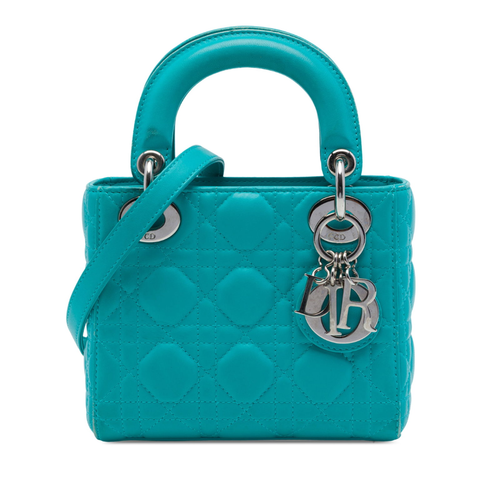 Dior Lady Dior Mini Cannage Lambskin Bag Blue: Dior Lady Dior Mini Cannage Lambskin Bag Blue A Mini Lady Dior handbag crafted in blue quilted lambskin leather with the signature Cannage pattern. This bag features flat leather top handles, a detach