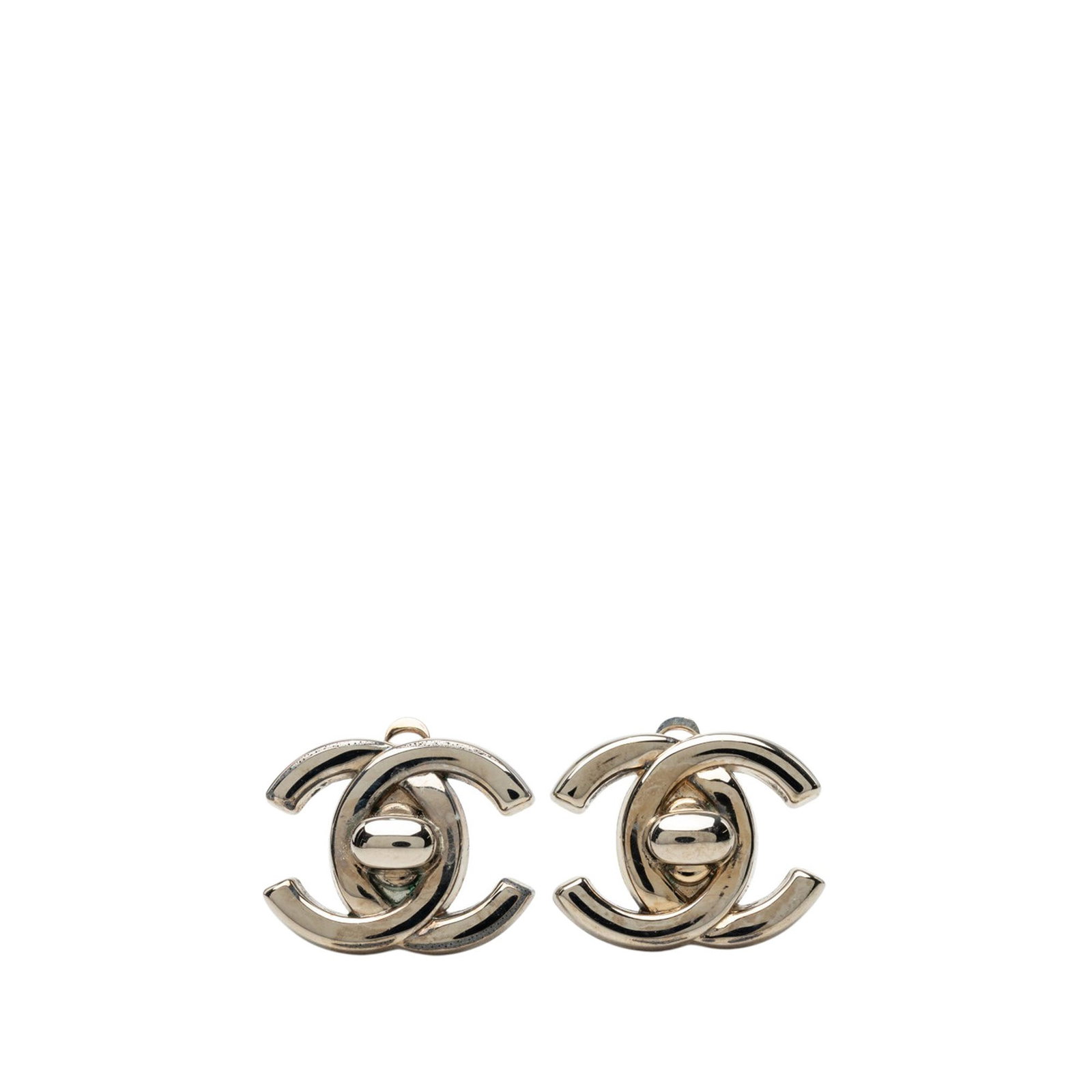Chanel CC Turn Lock Clip Earrings Silver Tone Metal: Chanel CC Turn Lock Clip Earrings Silver Tone Metal Chanel CC turn lock clip-on earrings in silver tone metal with a classic costume jewelry design. The pair is made in France and features clip-on clo