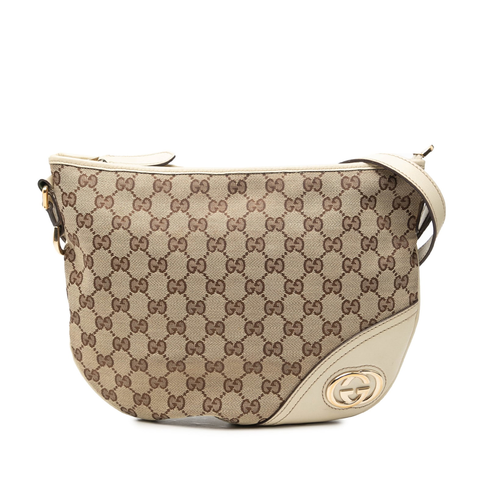 Gucci New Britt Half Moon canvas crossbody bag Medium GG: Gucci New Britt Half Moon canvas crossbody bag Medium GG This Gucci Medium GG Canvas New Britt Half Moon Crossbody bag features a canvas body with leather trim and an adjustable flat leather strap. It