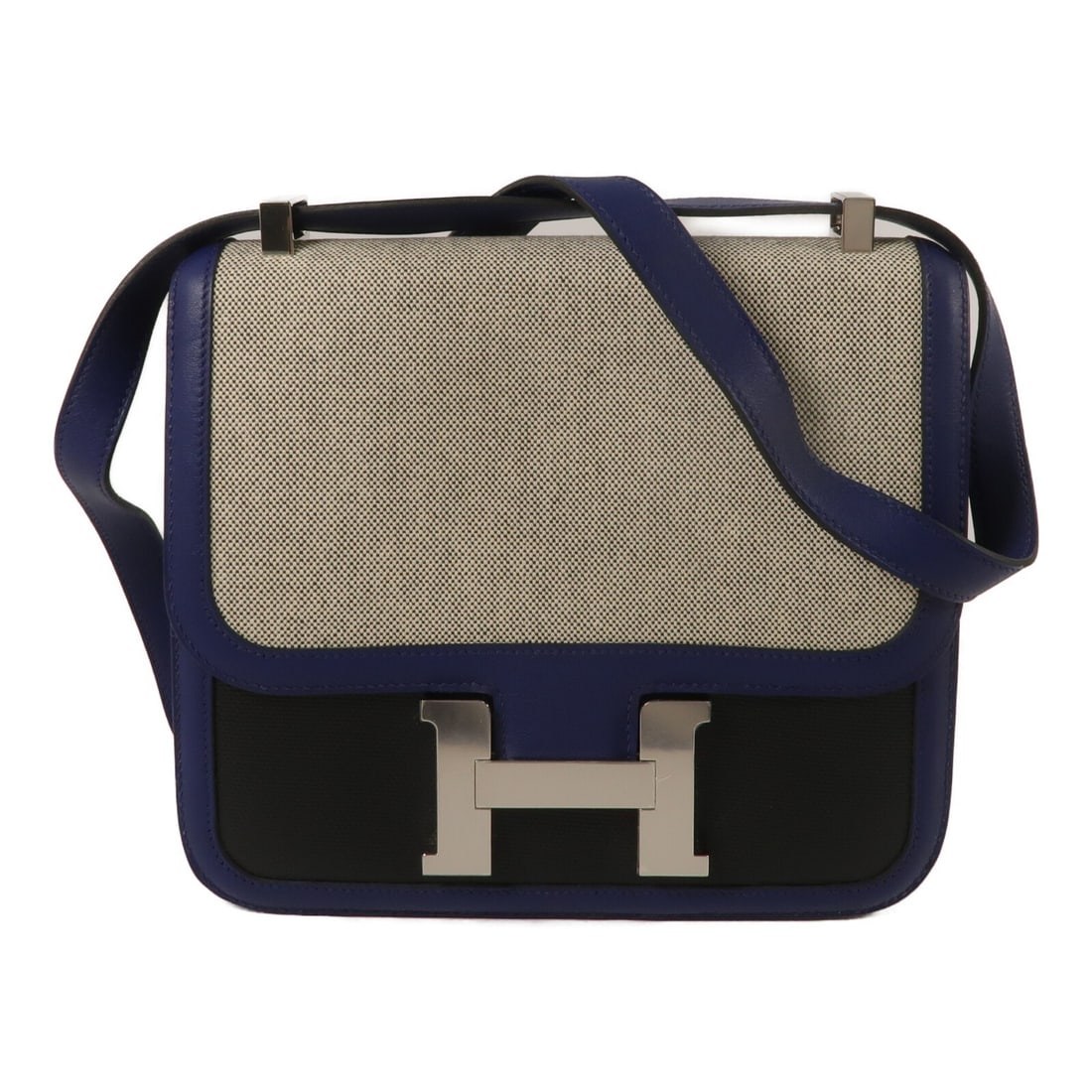 Hermes Constance 24 Shoulder Bag Swift Leather Canvas Bleu Sapphire Noir: Hermes Constance 24 Shoulder Bag Swift Leather Canvas Bleu Sapphire Noir Hermes Constance 24 bag in Swift leather, Toile Berline, and calfskin canvas in Bleu Sapphire and Noir. It features a flap clos